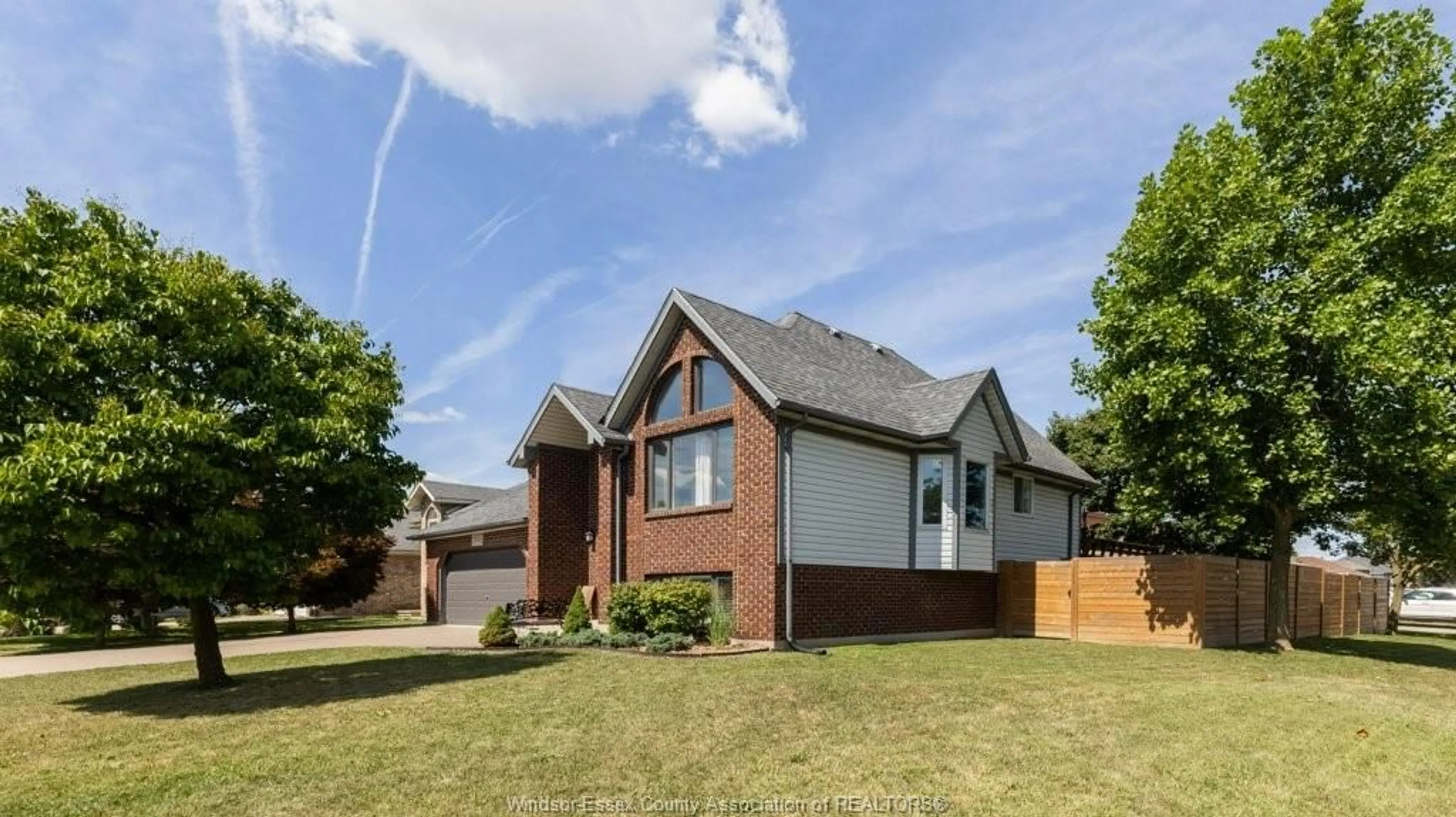Home with brick exterior material, street for 2840 WILDBERRY Cres, Tecumseh Ontario N9K 1C2