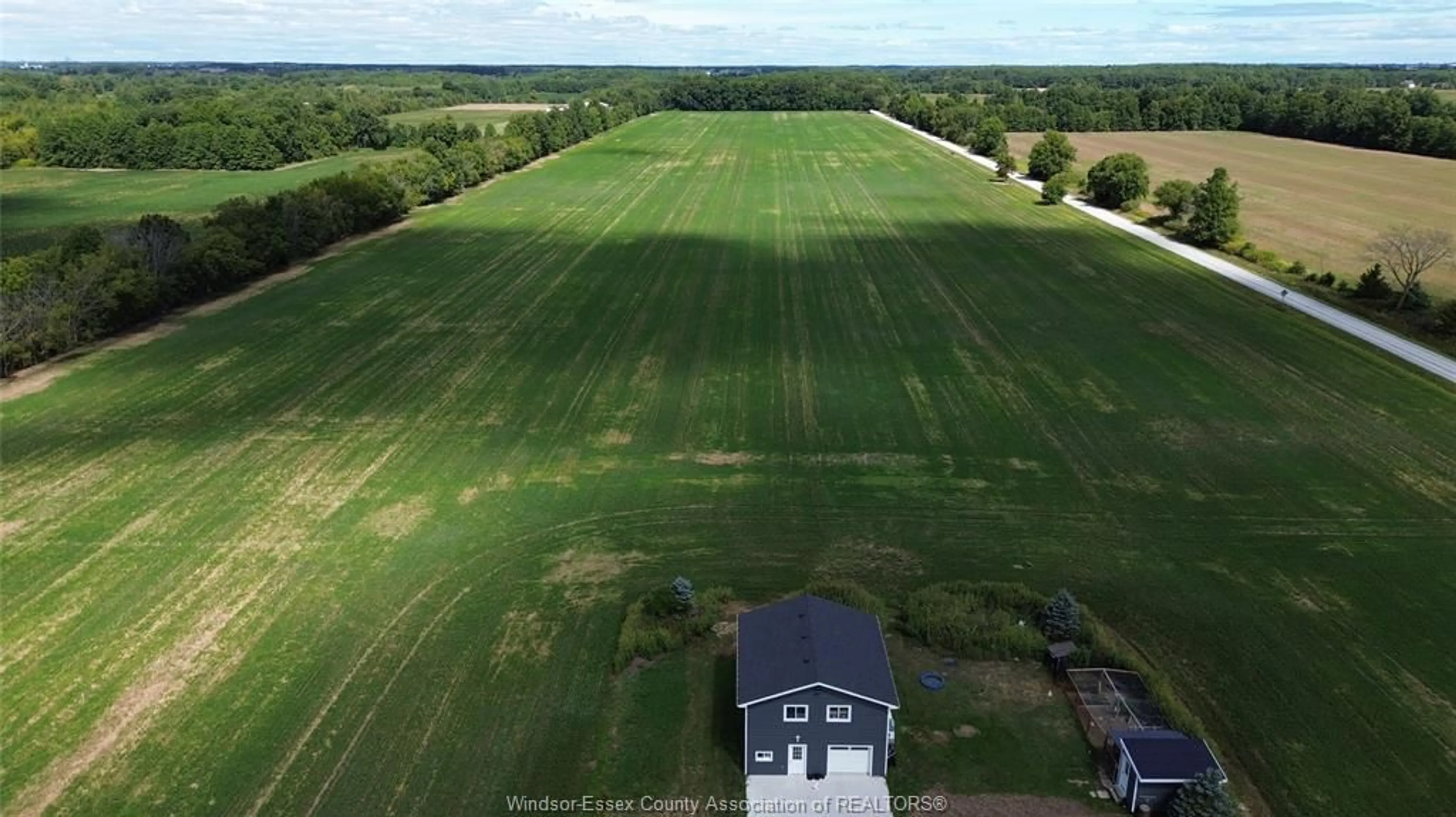 A pic from outside/outdoor area/front of a property/back of a property/a pic from drone, building for 5910 5TH CONESSION Rd, Harrow Ontario N0R 1G0