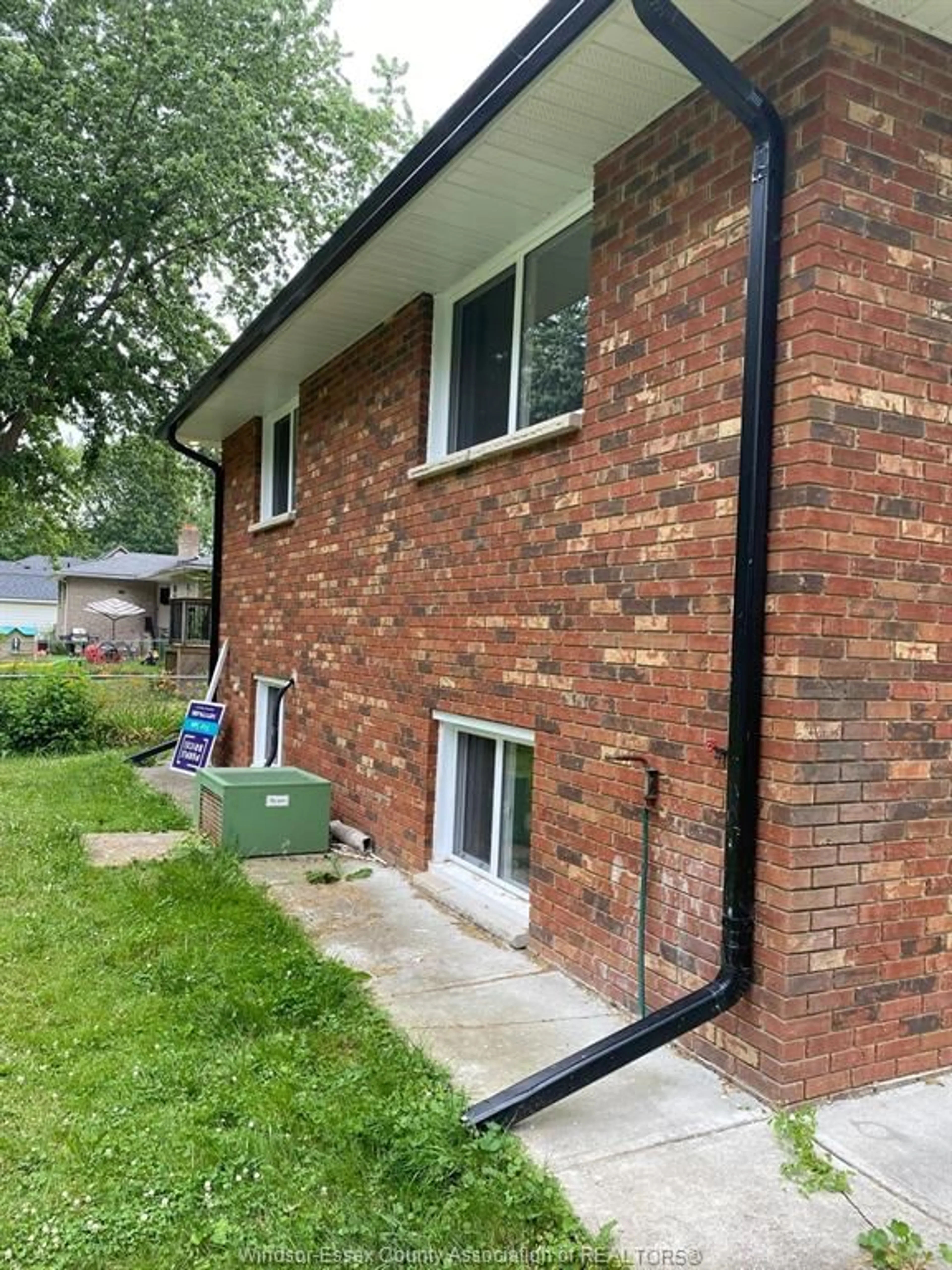 Home with brick exterior material, street for 770 COUSINEAU Rd, Windsor Ontario N9G 1V7