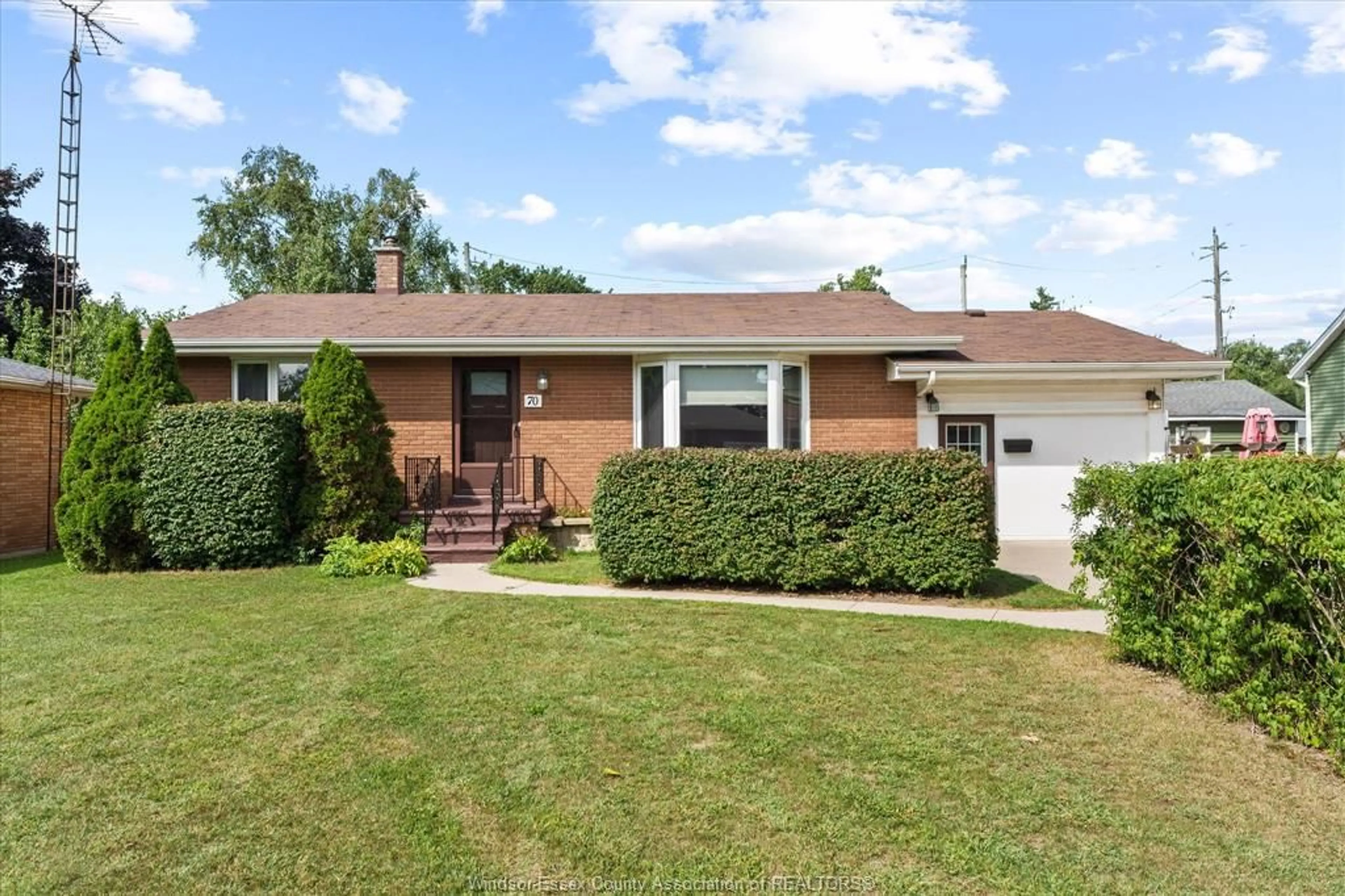 Home with vinyl exterior material, street for 70 PULFORD St, Kingsville Ontario N9Y 1B4