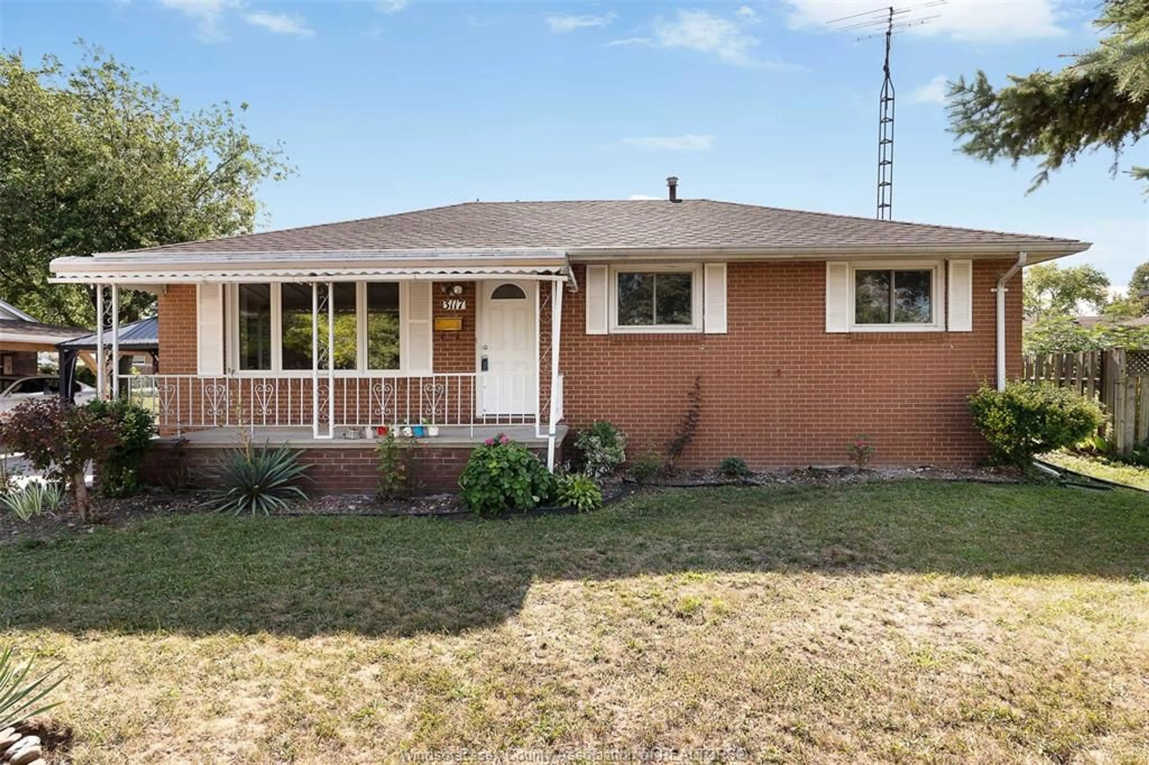 Home with brick exterior material, street for 3117 AUSTEN Dr, Windsor Ontario N8T 1Z6