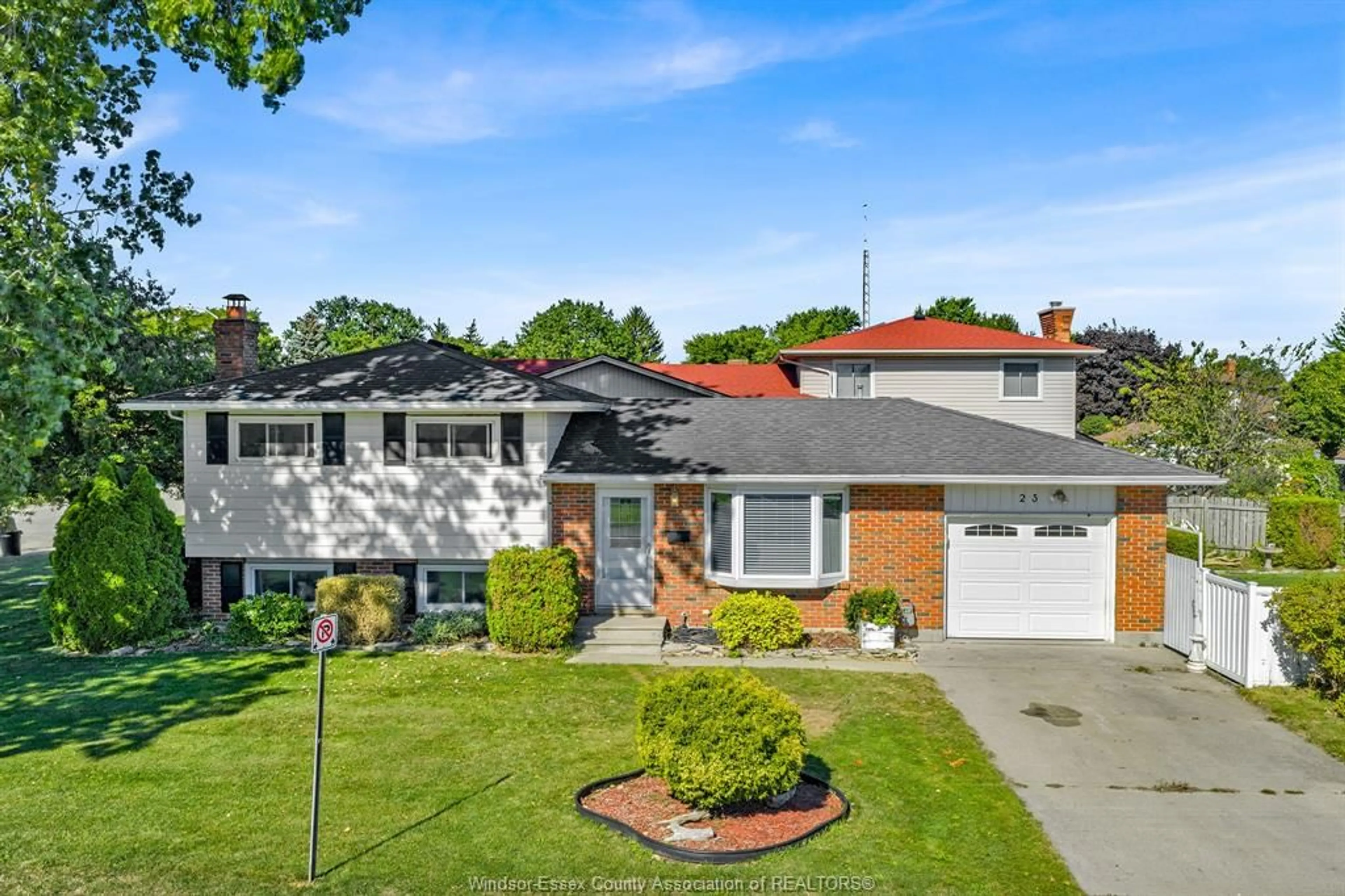 Home with brick exterior material, street for 23 Camelot Ave, Leamington Ontario N8H 4T7