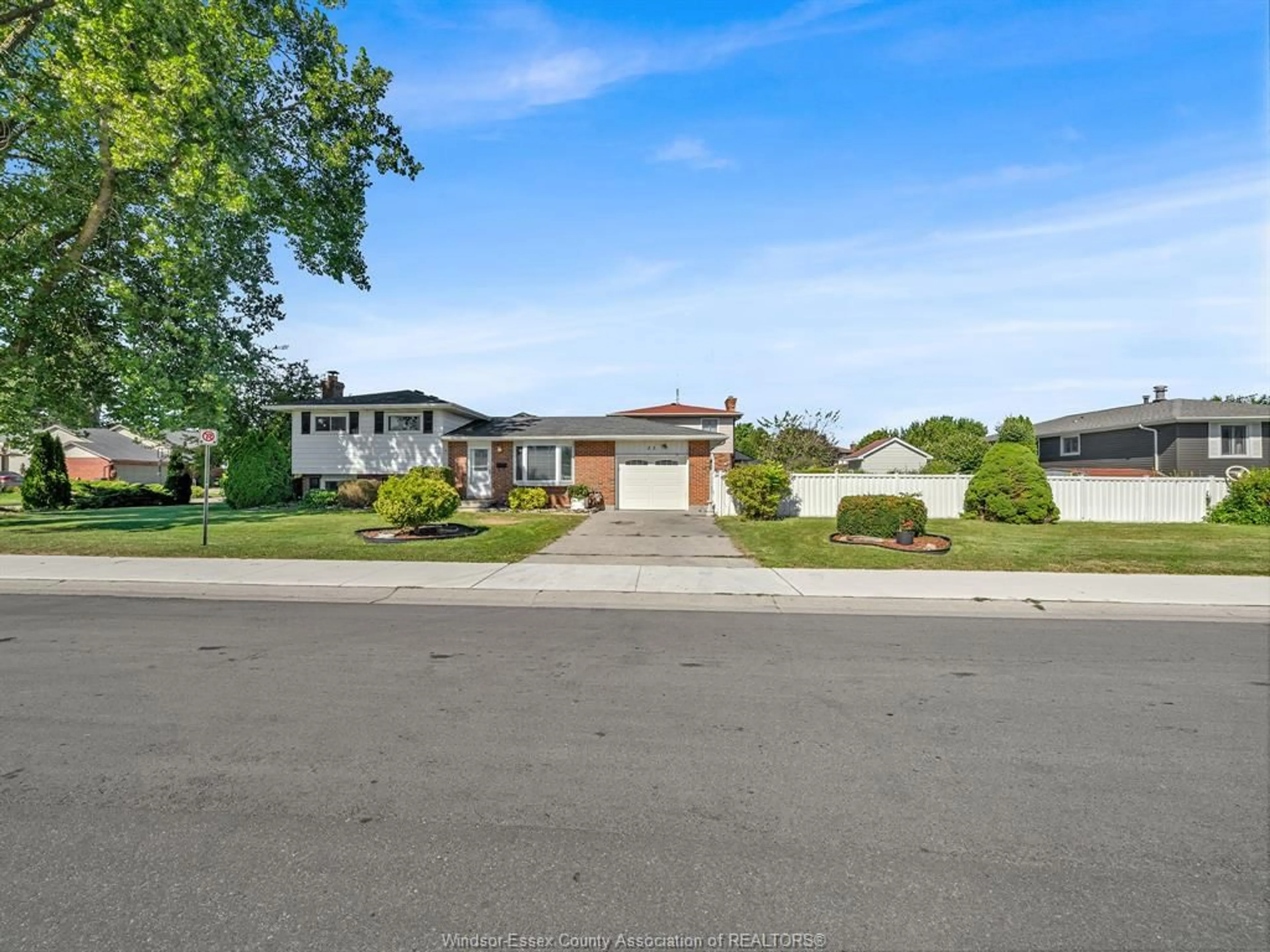 A pic from outside/outdoor area/front of a property/back of a property/a pic from drone, street for 23 Camelot Ave, Leamington Ontario N8H 4T7