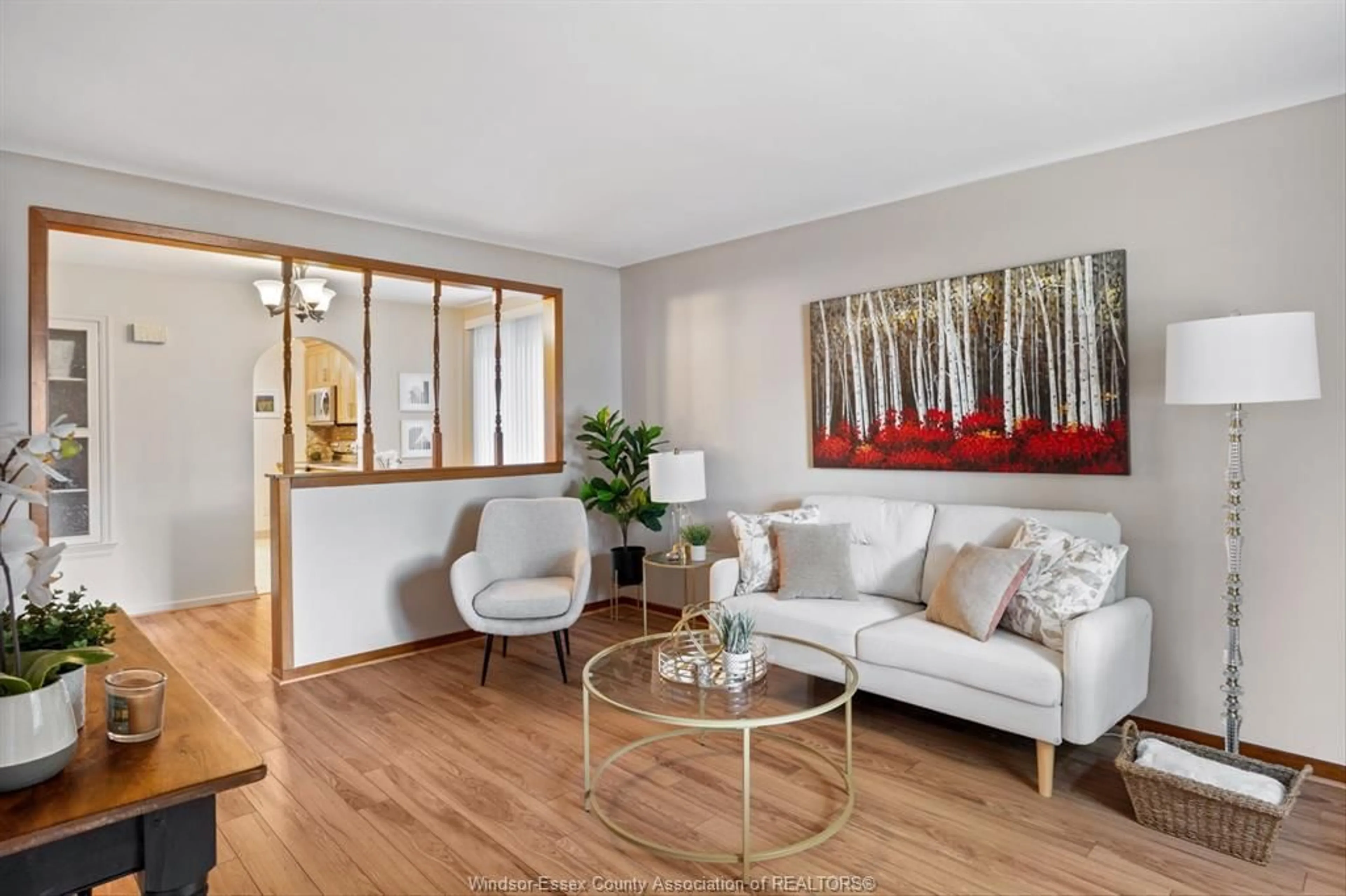 Living room with furniture, wood/laminate floor for 2662 TURNER, Windsor Ontario N8W 3L3