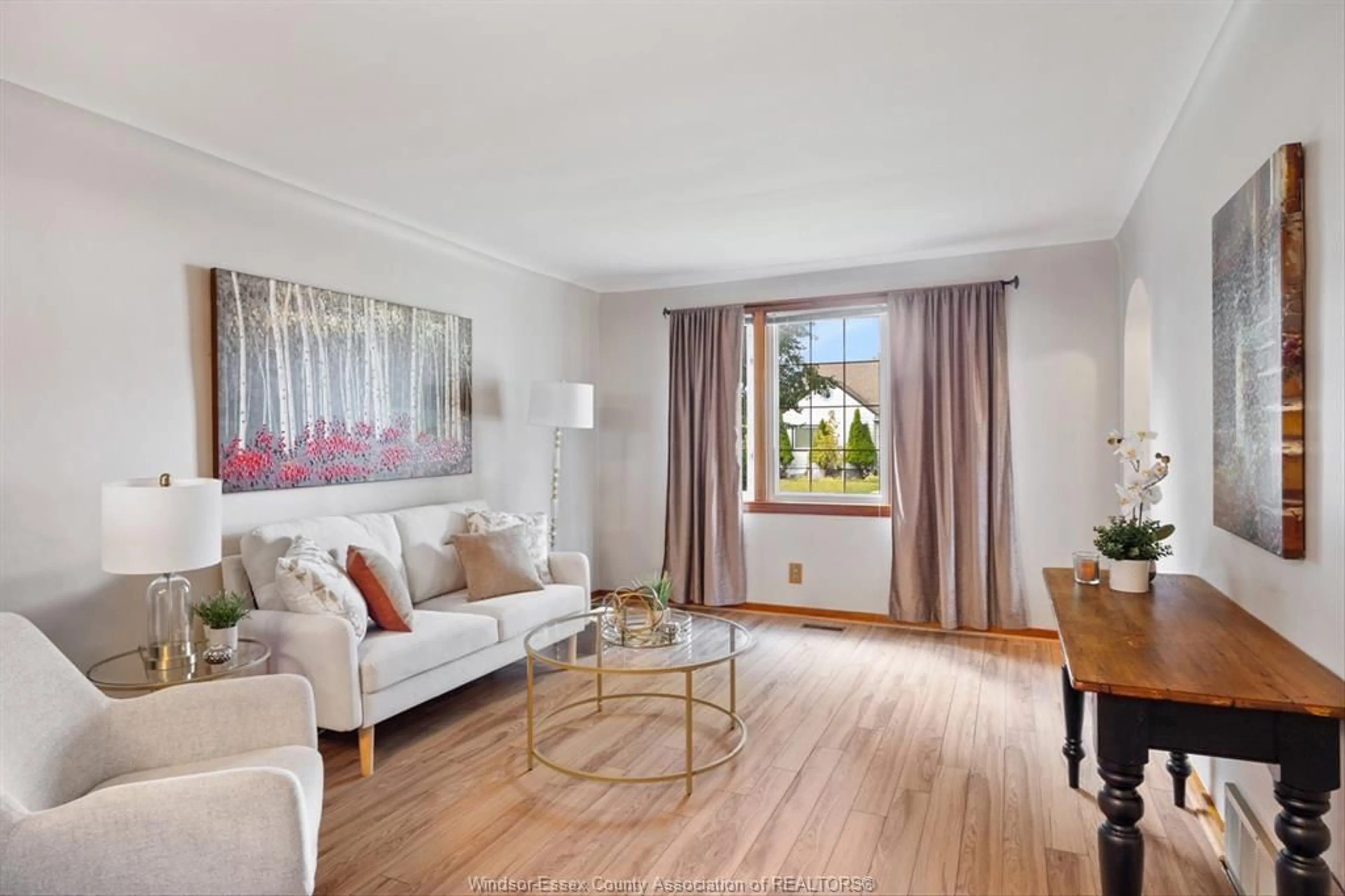 Living room with furniture, wood/laminate floor for 2662 TURNER, Windsor Ontario N8W 3L3