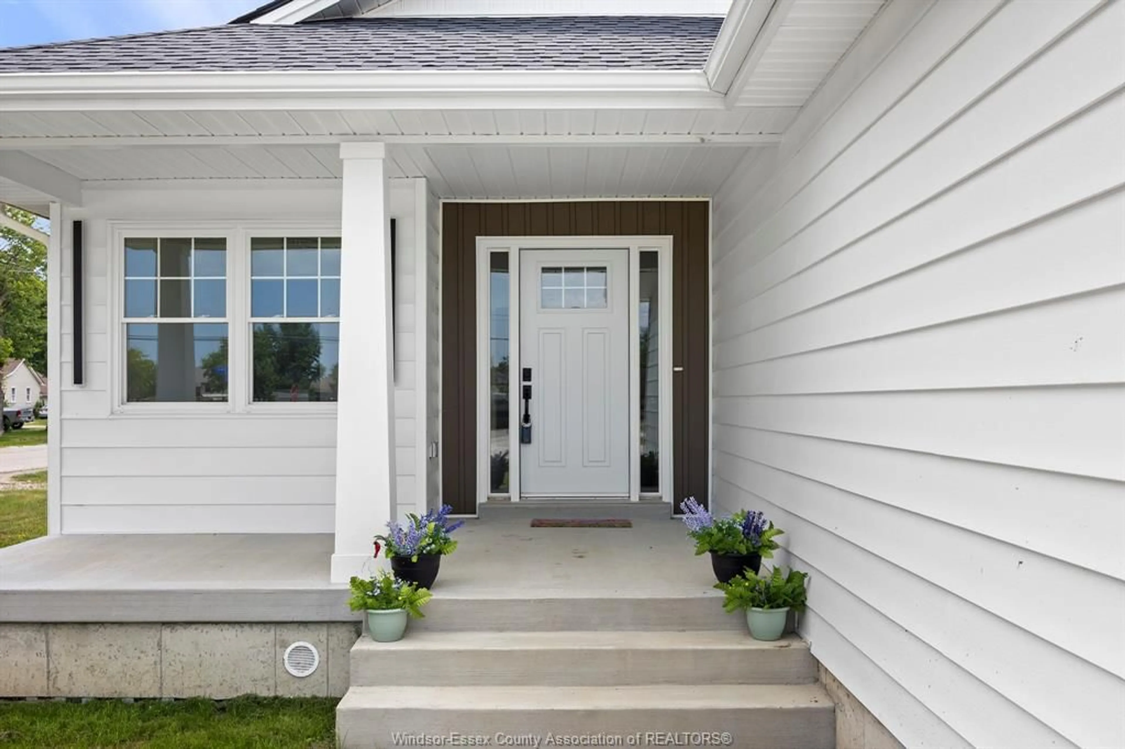 Home with vinyl exterior material, street for 70 MEDORA Ave, Essex Ontario N8M 2X9