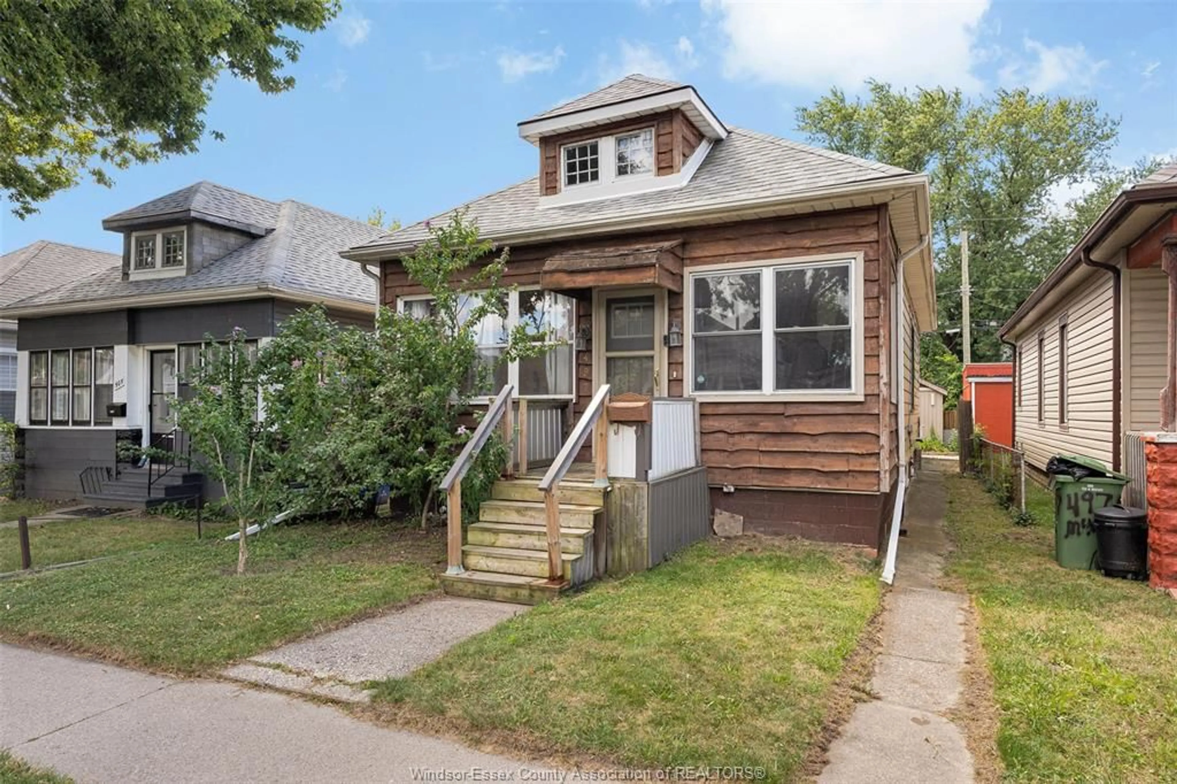 Home with brick exterior material, street for 497 MCKAY Ave, Windsor Ontario N9B 1Z7