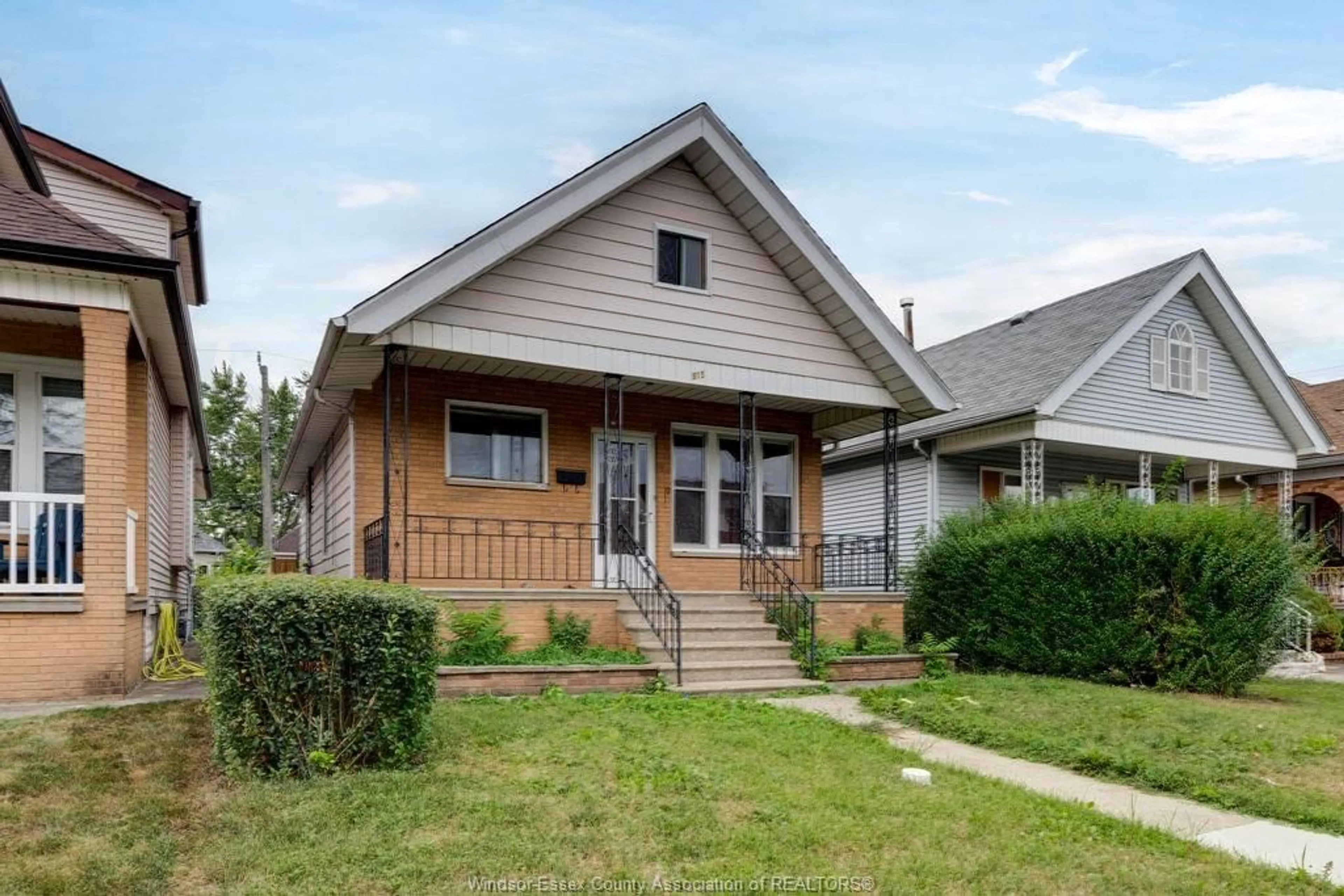 Home with brick exterior material, street for 915 ELSMERE, Windsor Ontario N9A 2A8