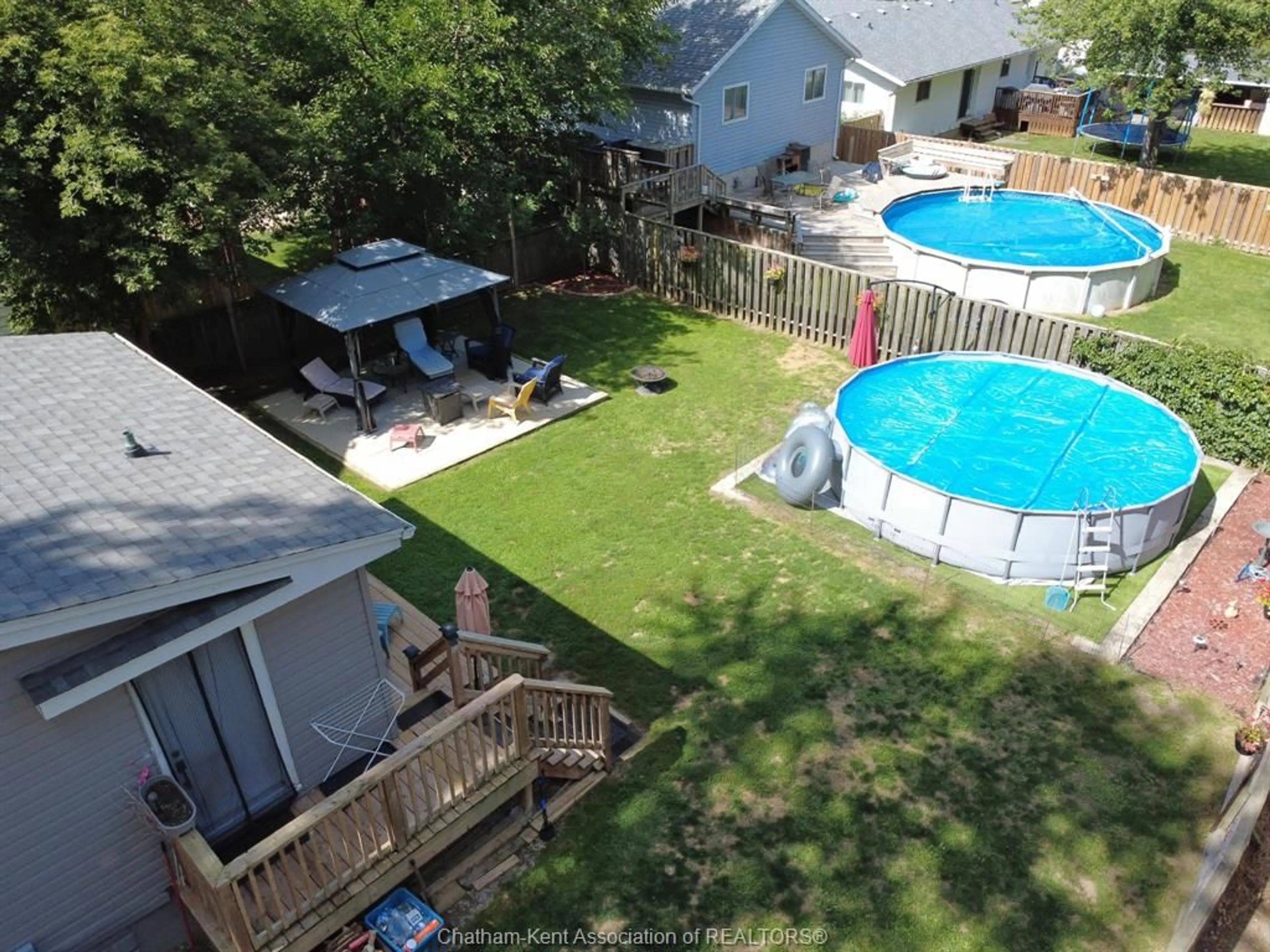 A pic from outside/outdoor area/front of a property/back of a property/a pic from drone, water/lake/river/ocean view for 111 Church St, Blenheim Ontario N0P 1A0