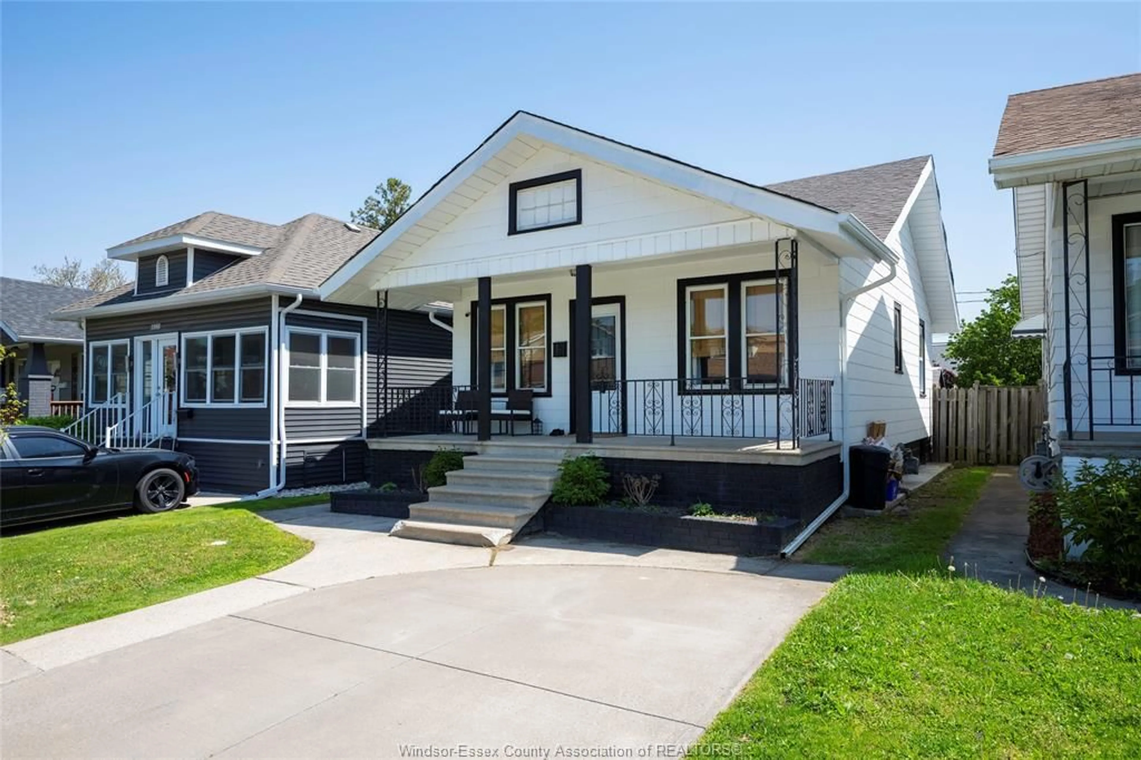 Home with vinyl exterior material, street for 1072 ELM Ave, Windsor Ontario N9A 5H7
