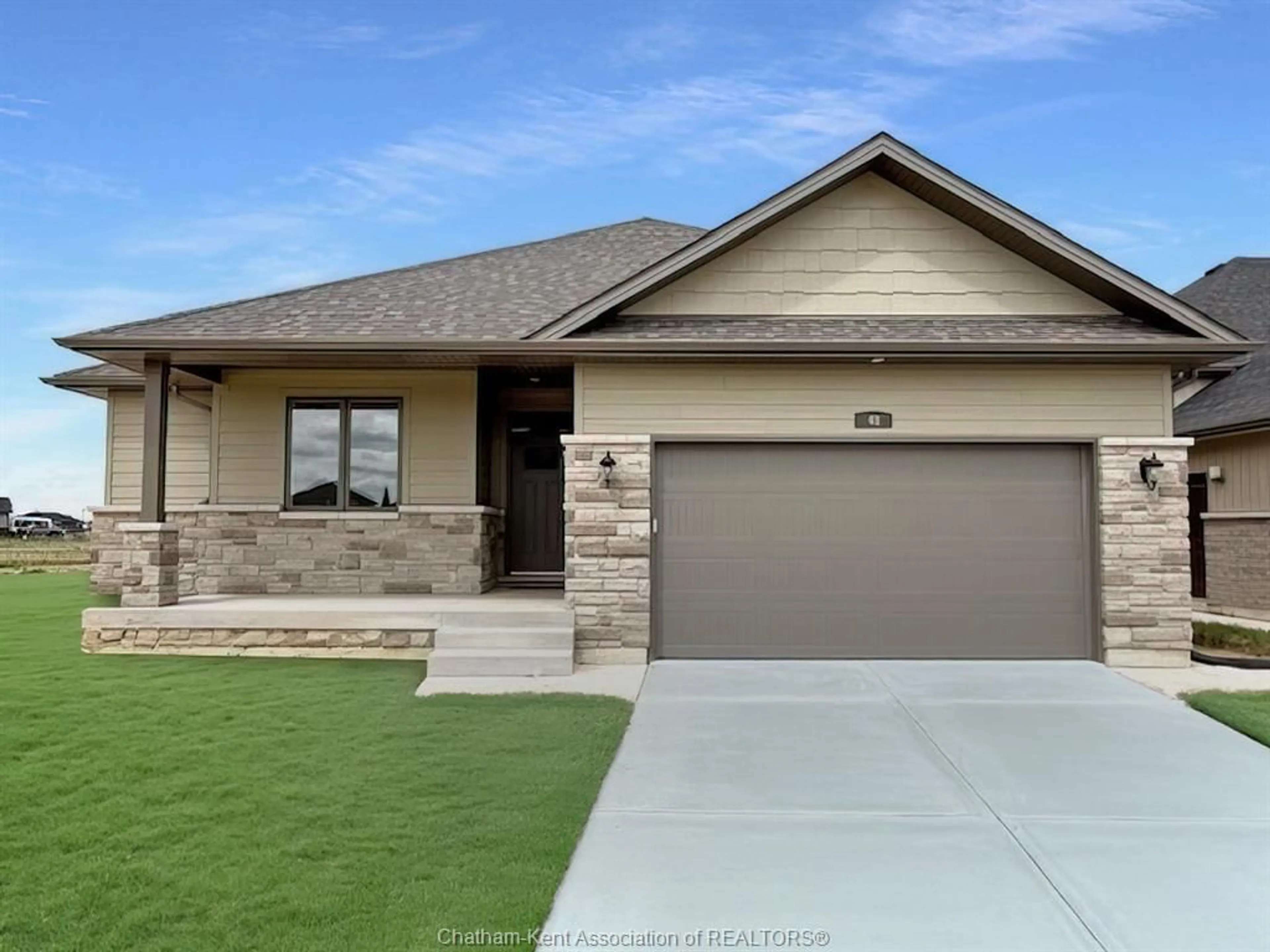 Home with brick exterior material, street for 48 Cherry Blossom Trail, Chatham Ontario N7L 0H1