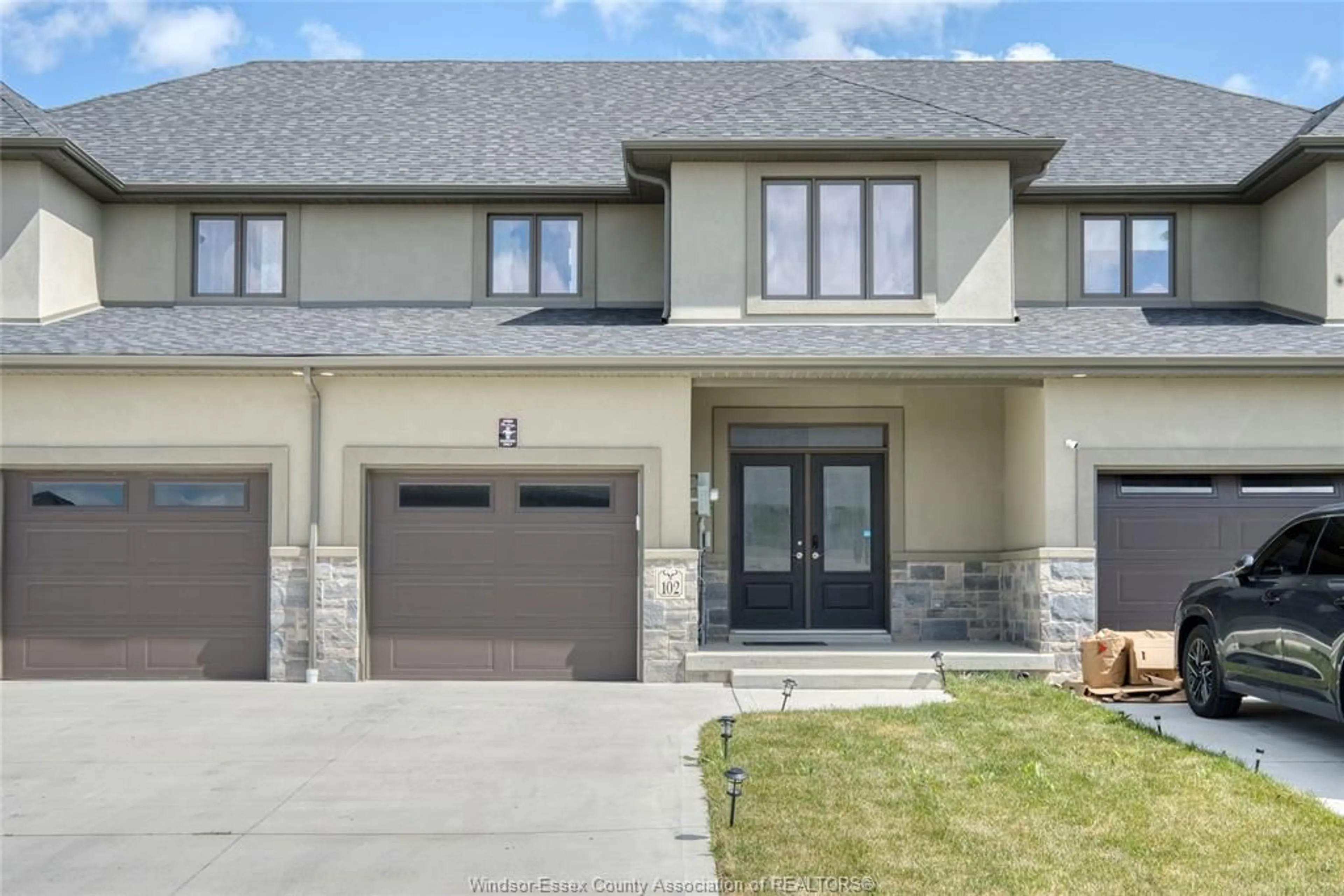 Home with brick exterior material, street for 102 LANE St, Essex Ontario N8M 0B2