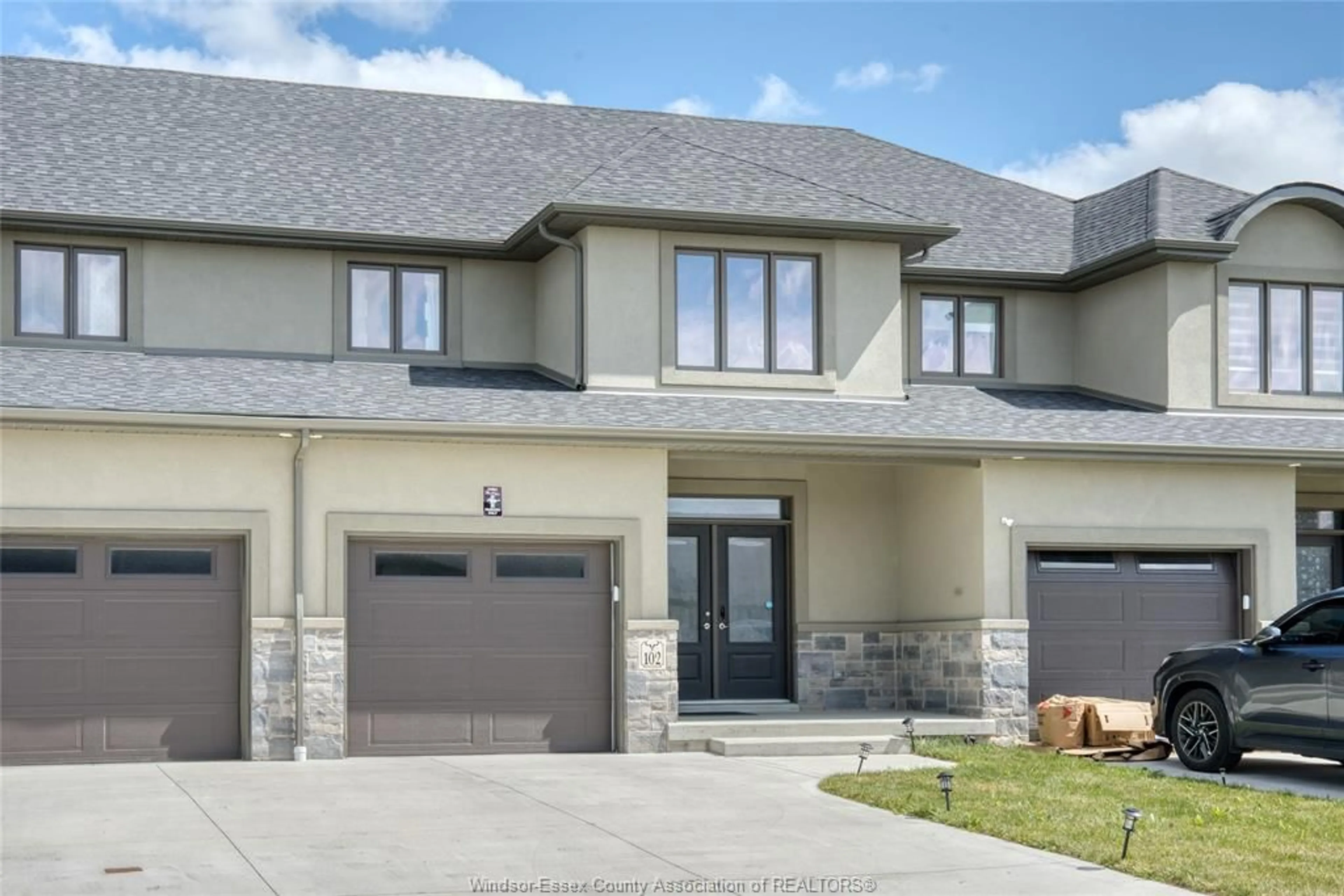 Home with brick exterior material, street for 102 LANE St, Essex Ontario N8M 0B2