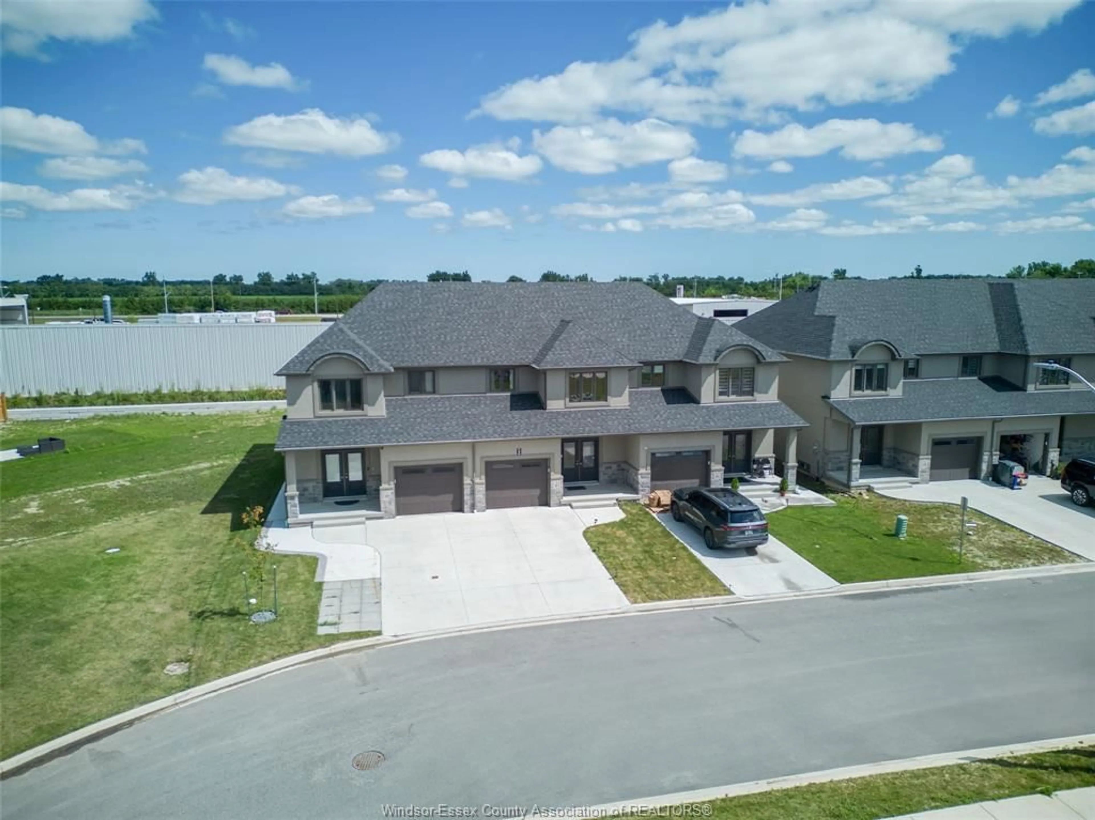 A pic from outside/outdoor area/front of a property/back of a property/a pic from drone, unknown for 102 LANE St, Essex Ontario N8M 0B2