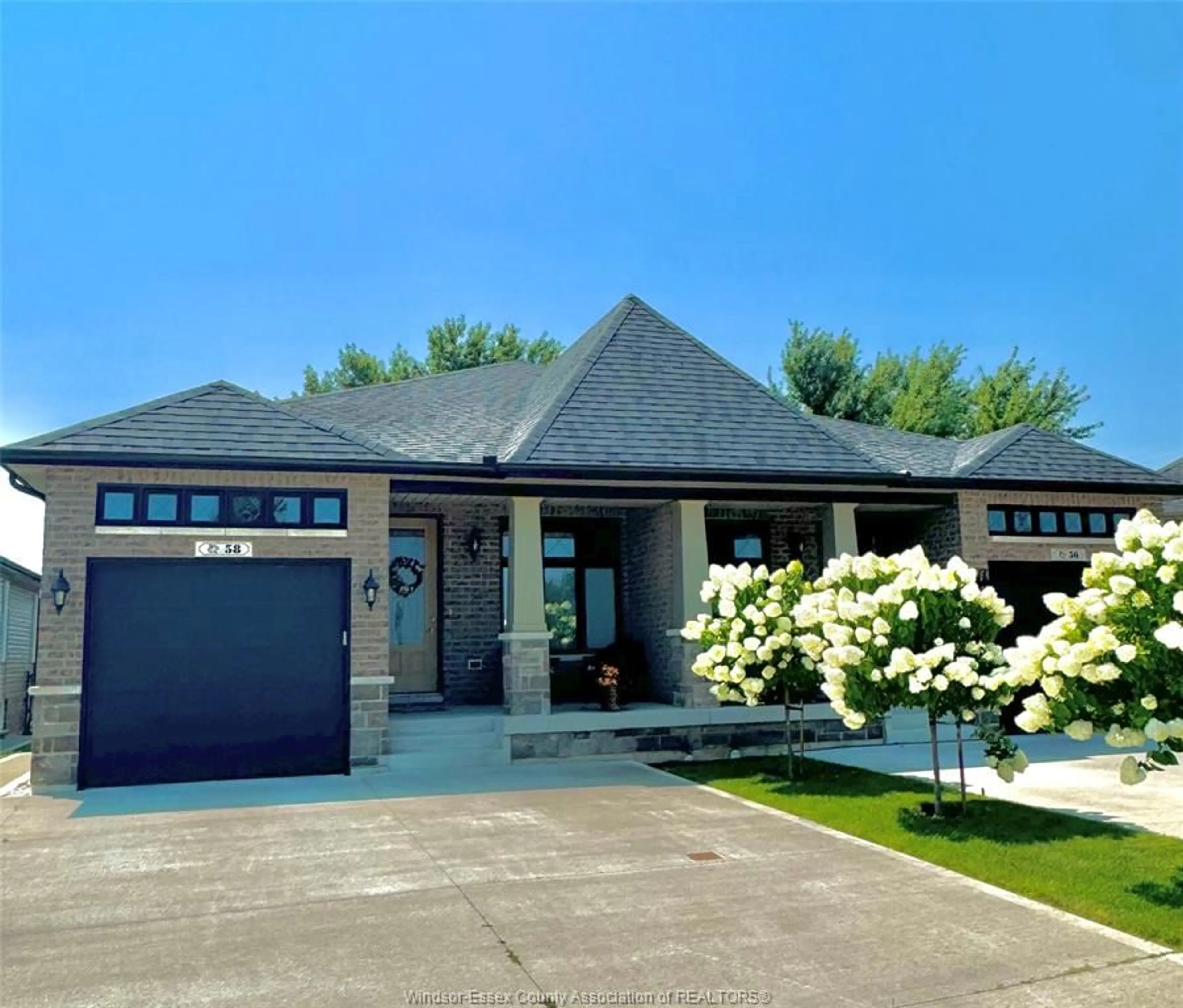 Home with brick exterior material, street for 58 HAZEL Cres, Kingsville Ontario N9Y 0B1