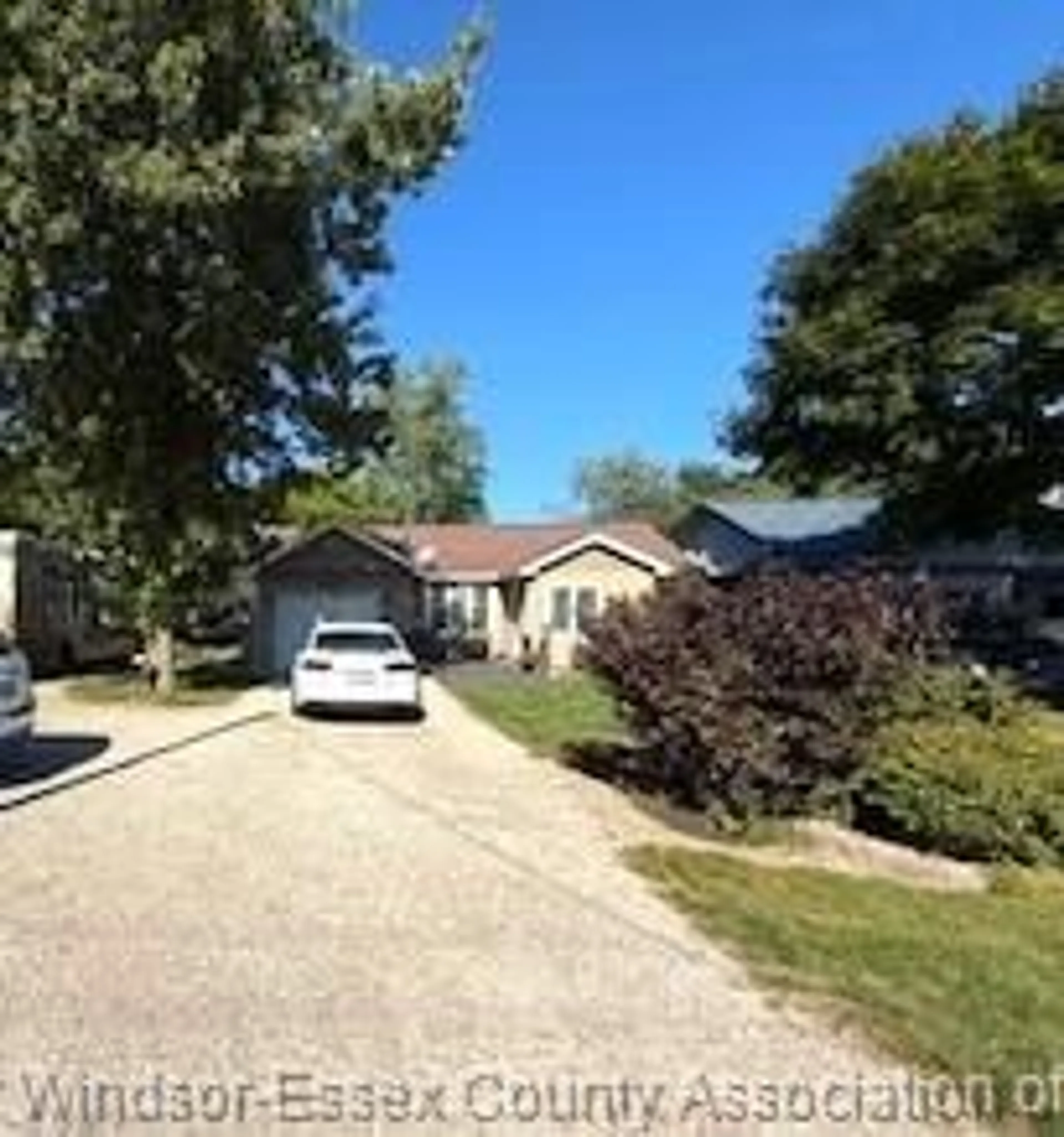 A pic from outside/outdoor area/front of a property/back of a property/a pic from drone, street for 641 Point Pelee Dr., Leamington Ontario N8H 3V4
