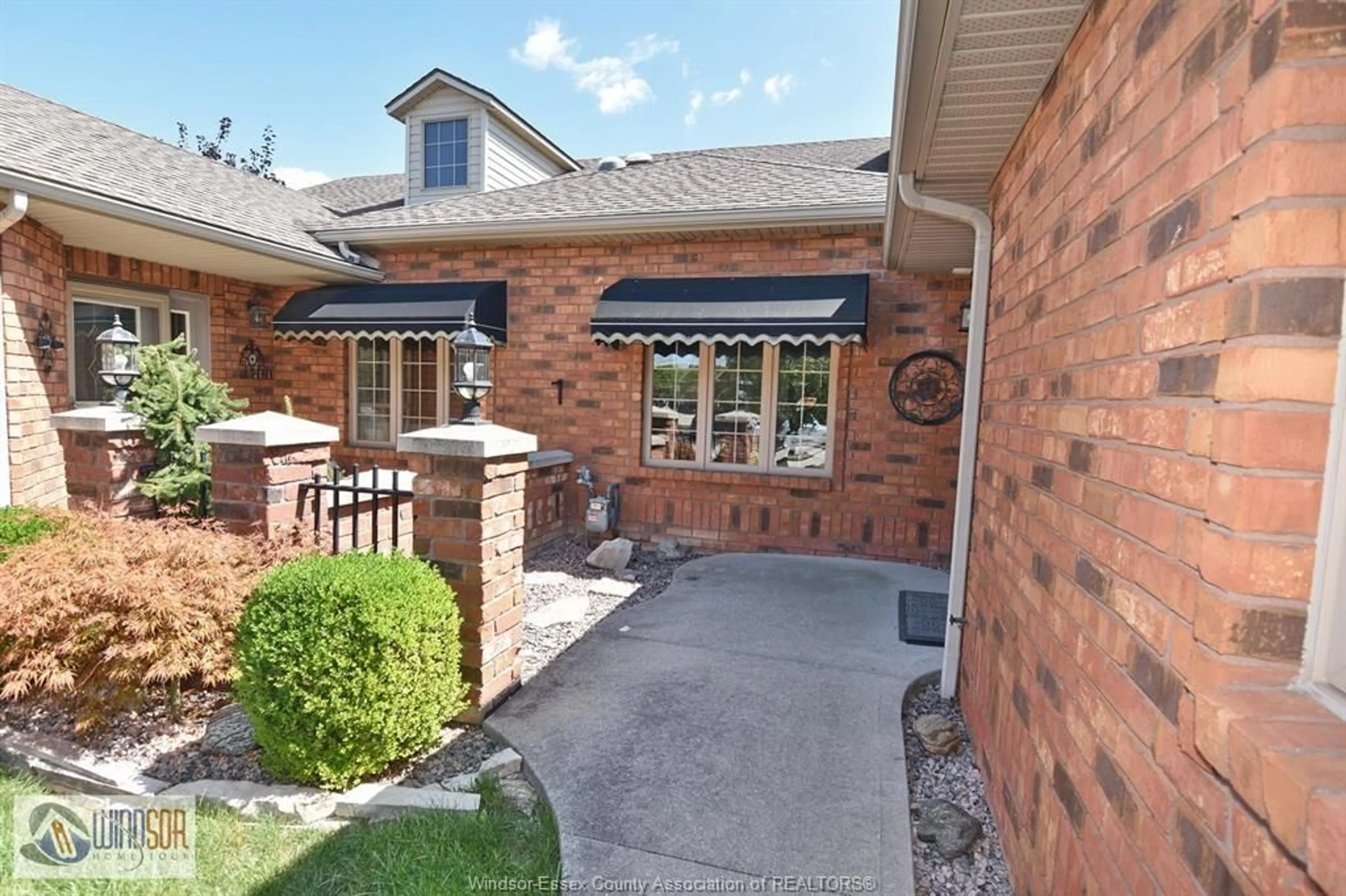 Home with brick exterior material, street for 387 MILLSTONE Lane, Belle River Ontario N8L 0P4