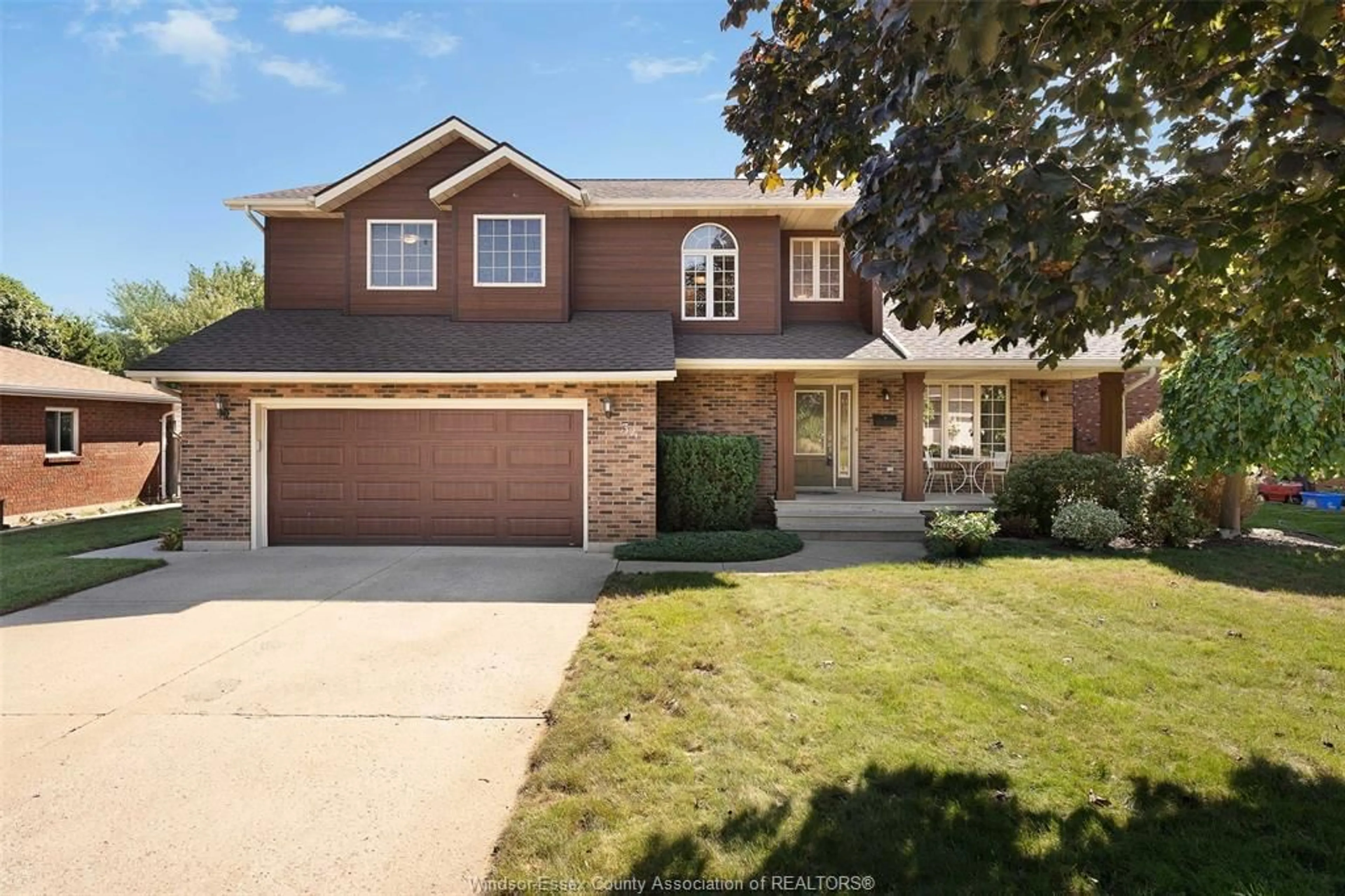 Home with brick exterior material, street for 34 CHERRYWOOD Ave, Leamington Ontario N8H 4Z9