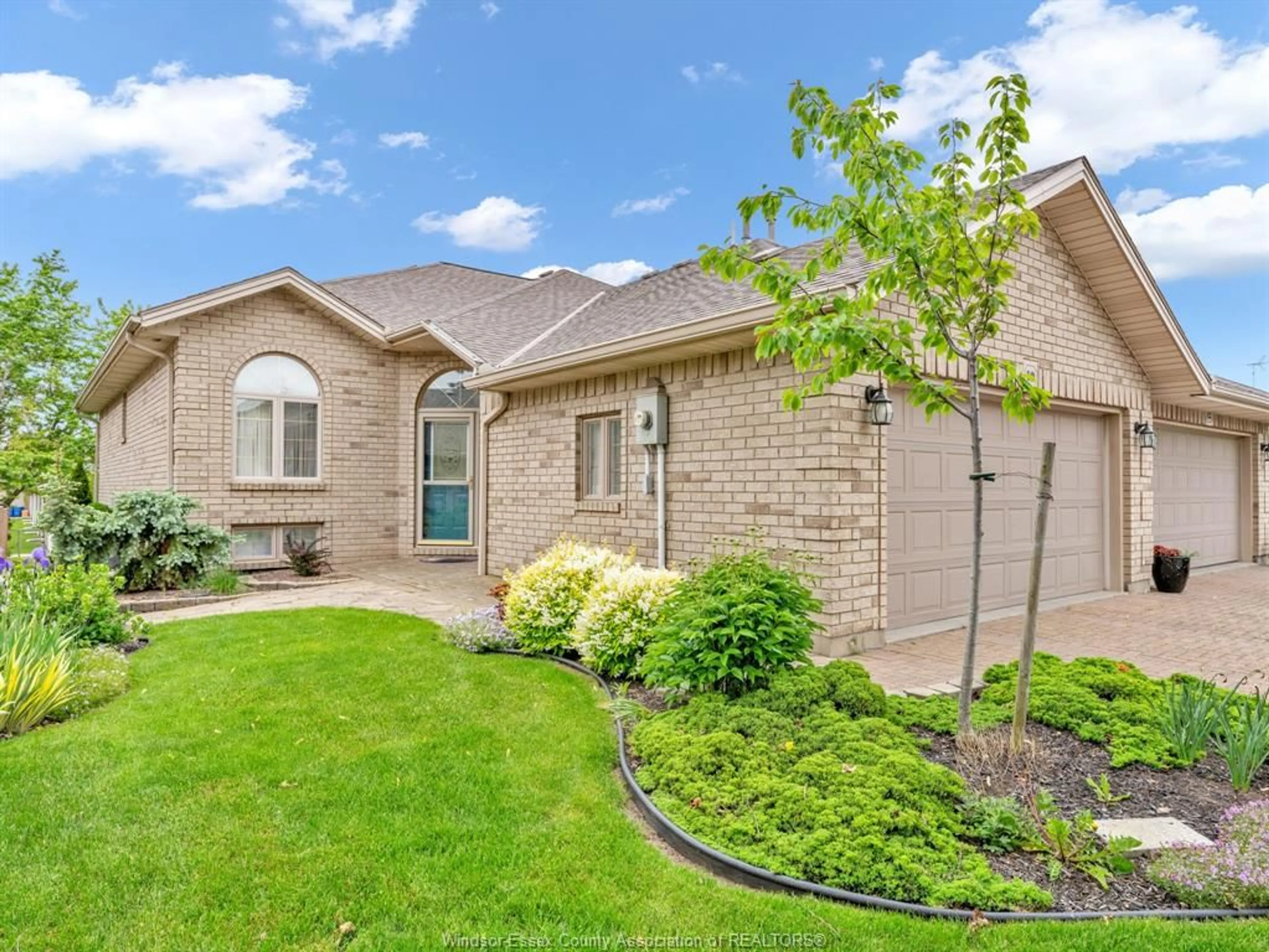 Home with brick exterior material, street for 10 QUEENS HILL Cres, Leamington Ontario N8H 5M6