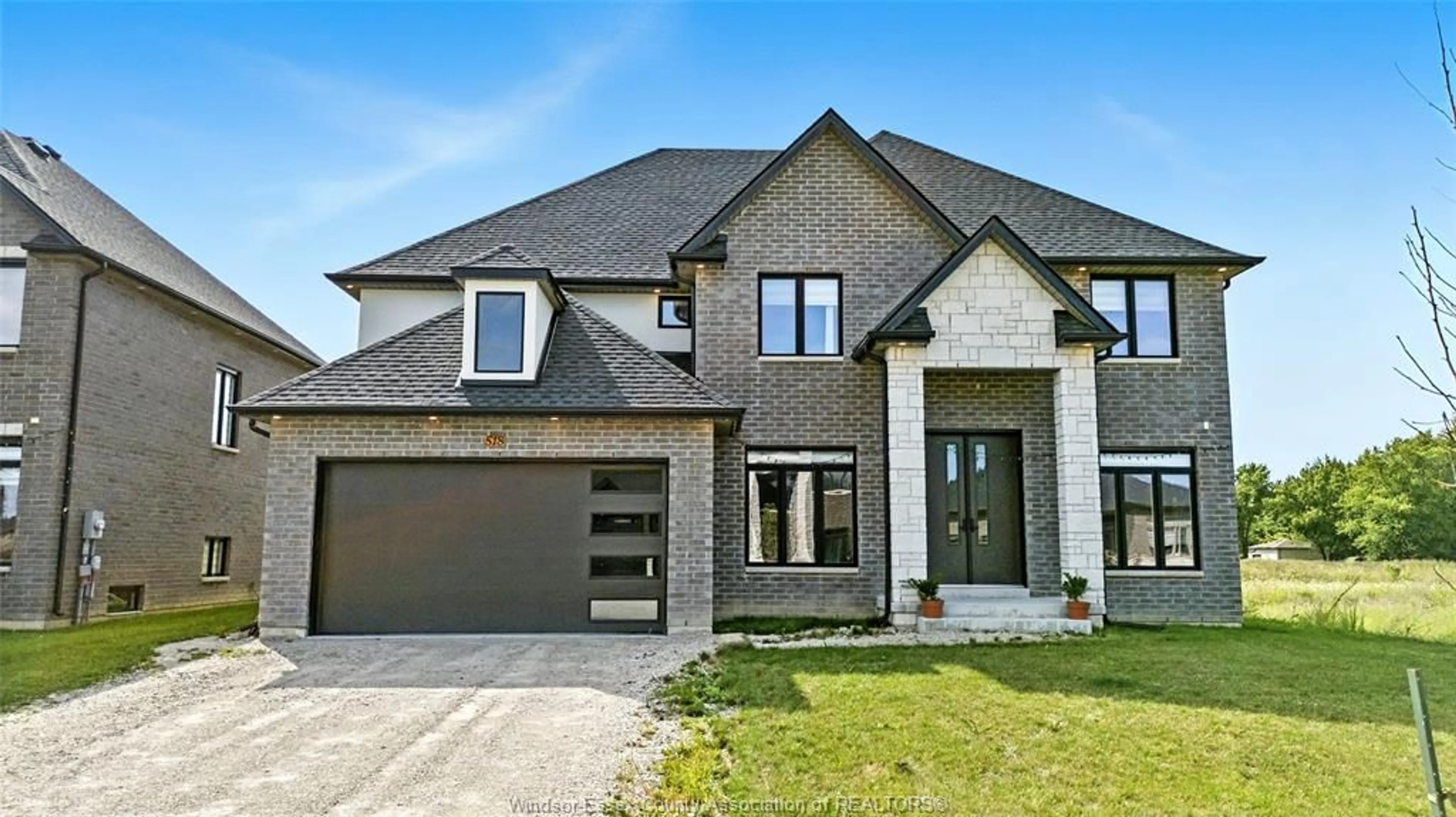 Home with brick exterior material, street for 518 VENETO St, Lakeshore Ontario N8L 0K4