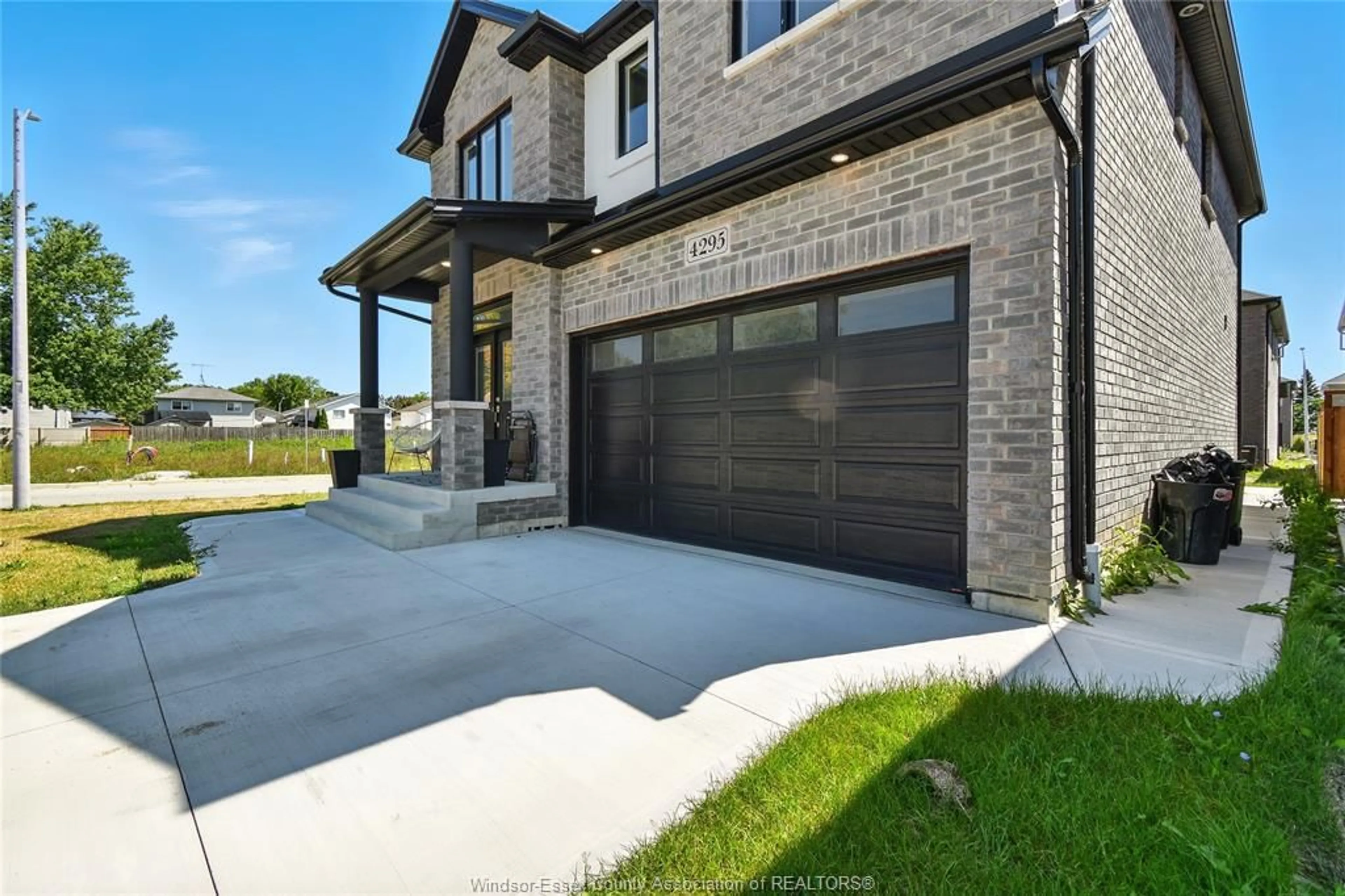 Home with brick exterior material, street for 4295 JOHN ROSS Crt, Windsor Ontario N8W 5S9