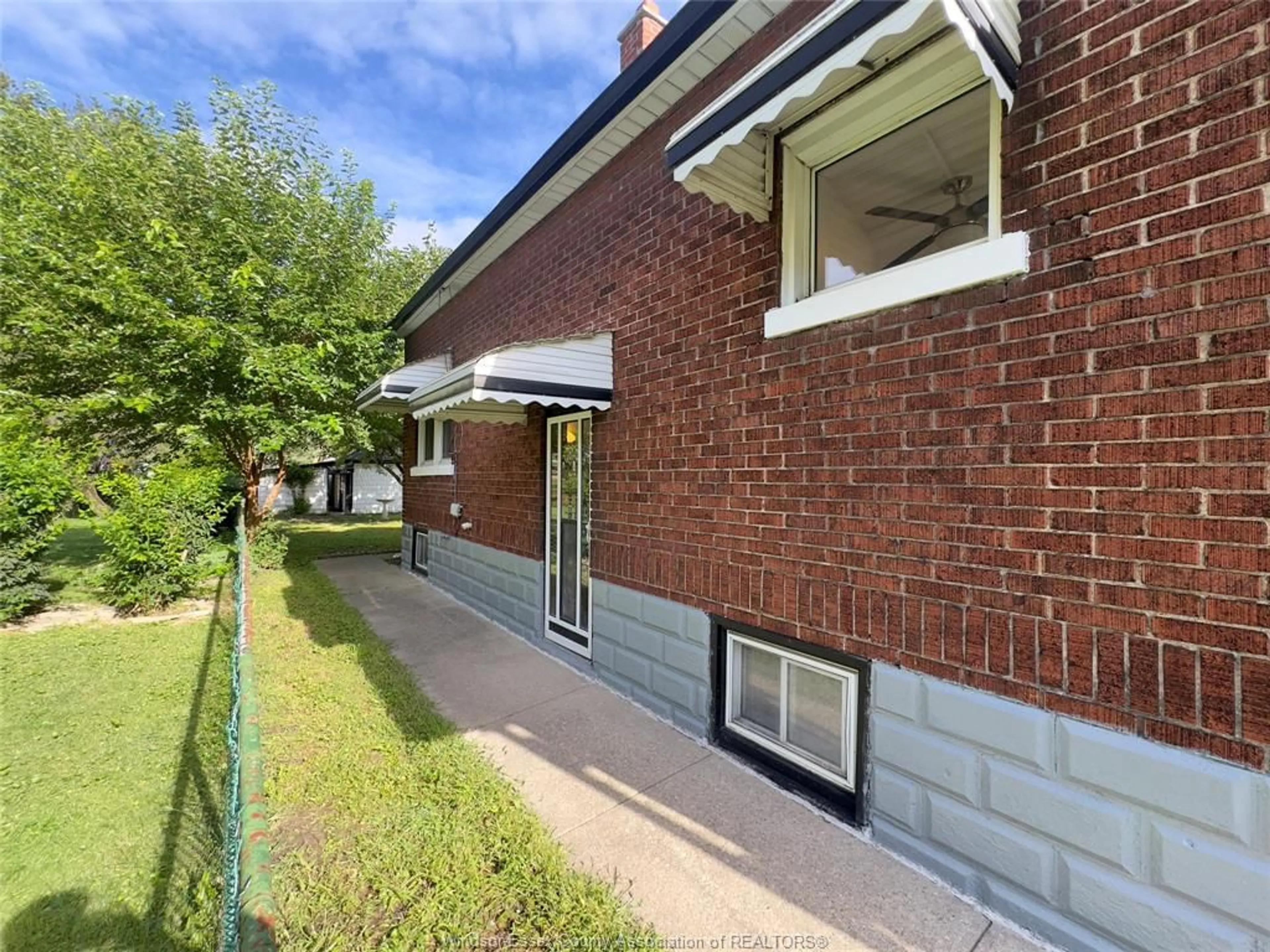 Home with brick exterior material, street for 3536 BLOOMFIELD Rd, Windsor Ontario N9C 1R7