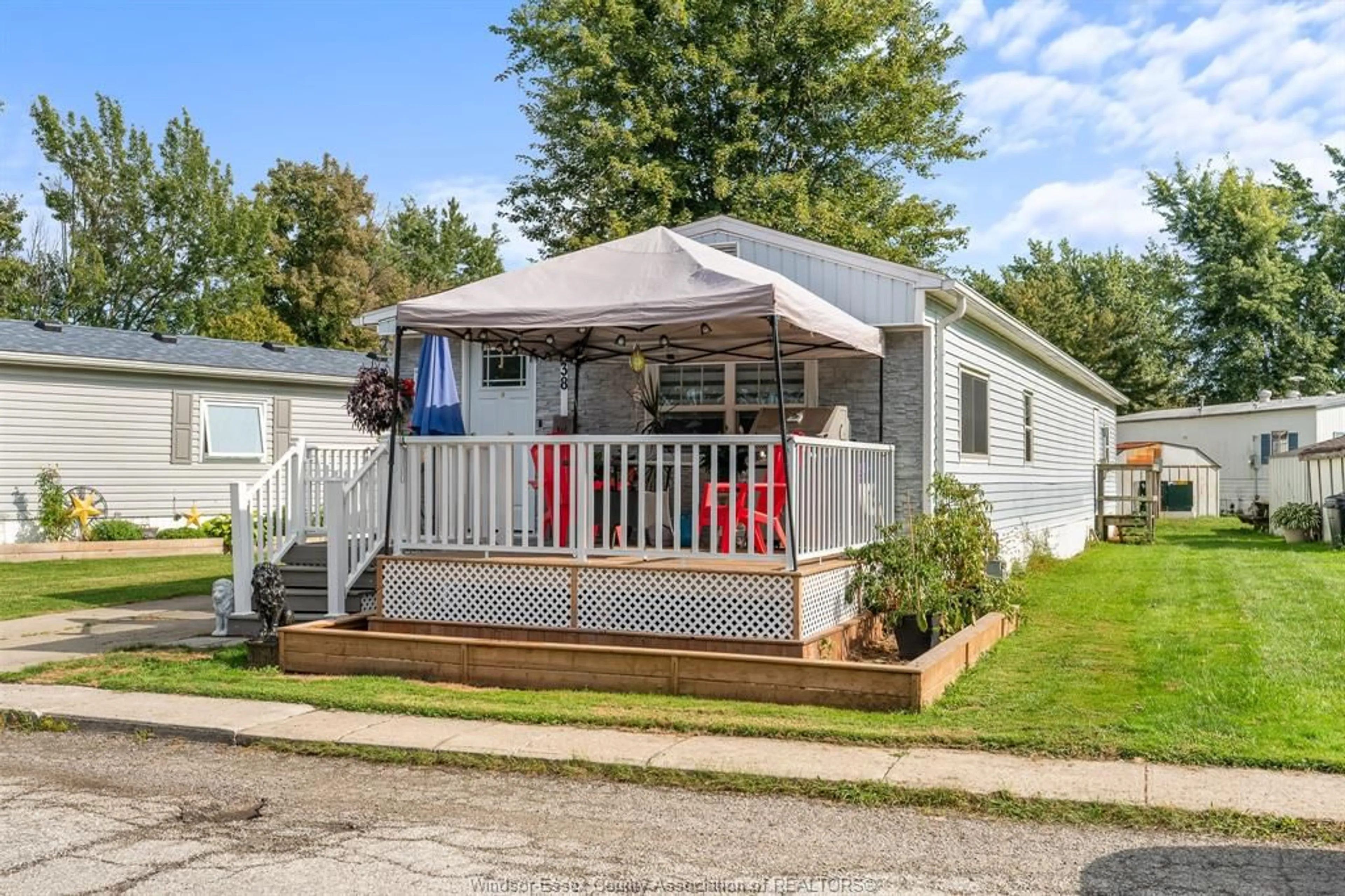 Home with vinyl exterior material, street for 138 Dana Dr, Essex Ontario N8M 2A3