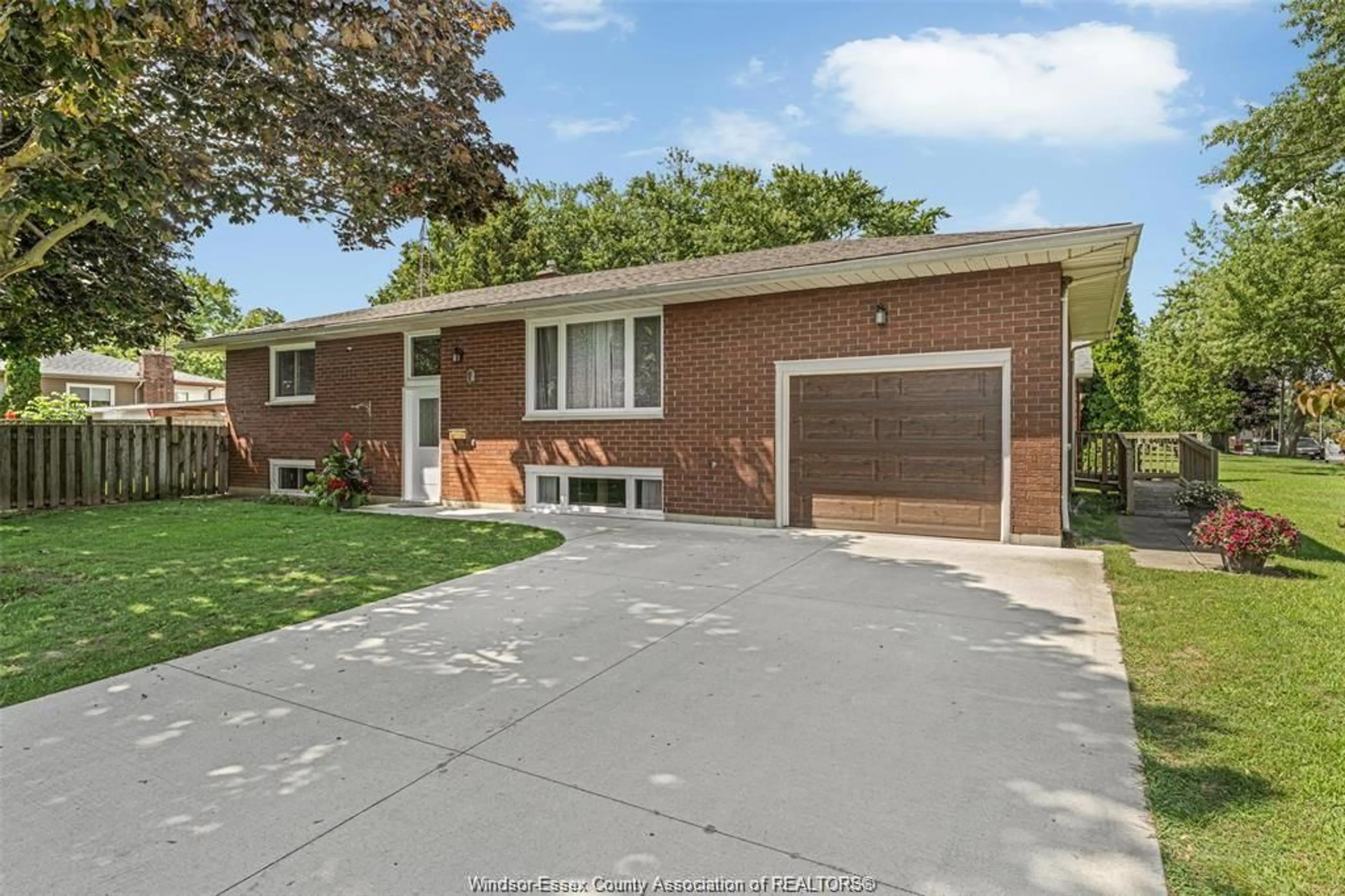 Home with brick exterior material, street for 1 SUTTON Dr, Leamington Ontario N8H 4P3