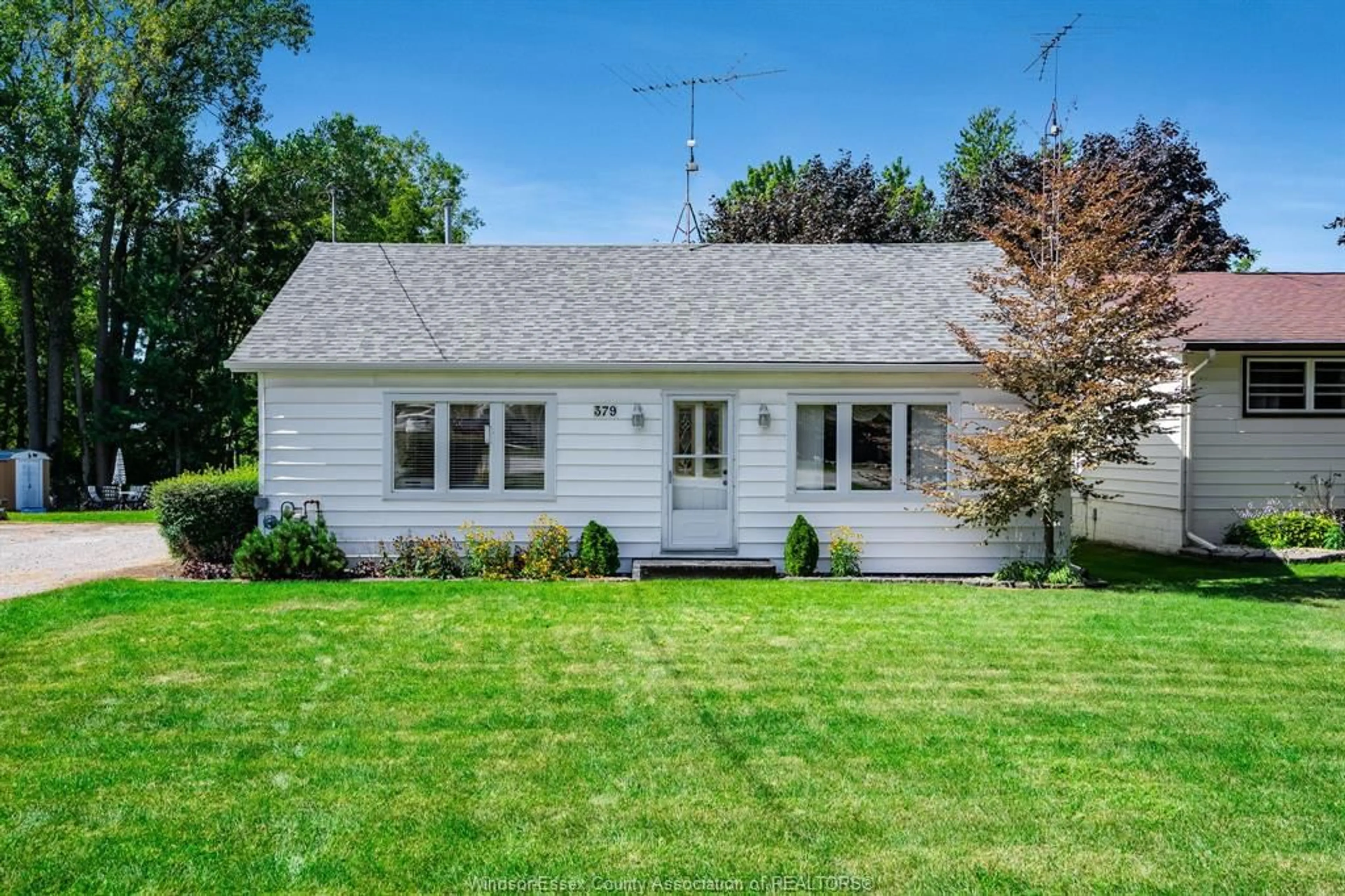 Home with vinyl exterior material, street for 379 County Rd 34, Kingsville Ontario N8M 2X5