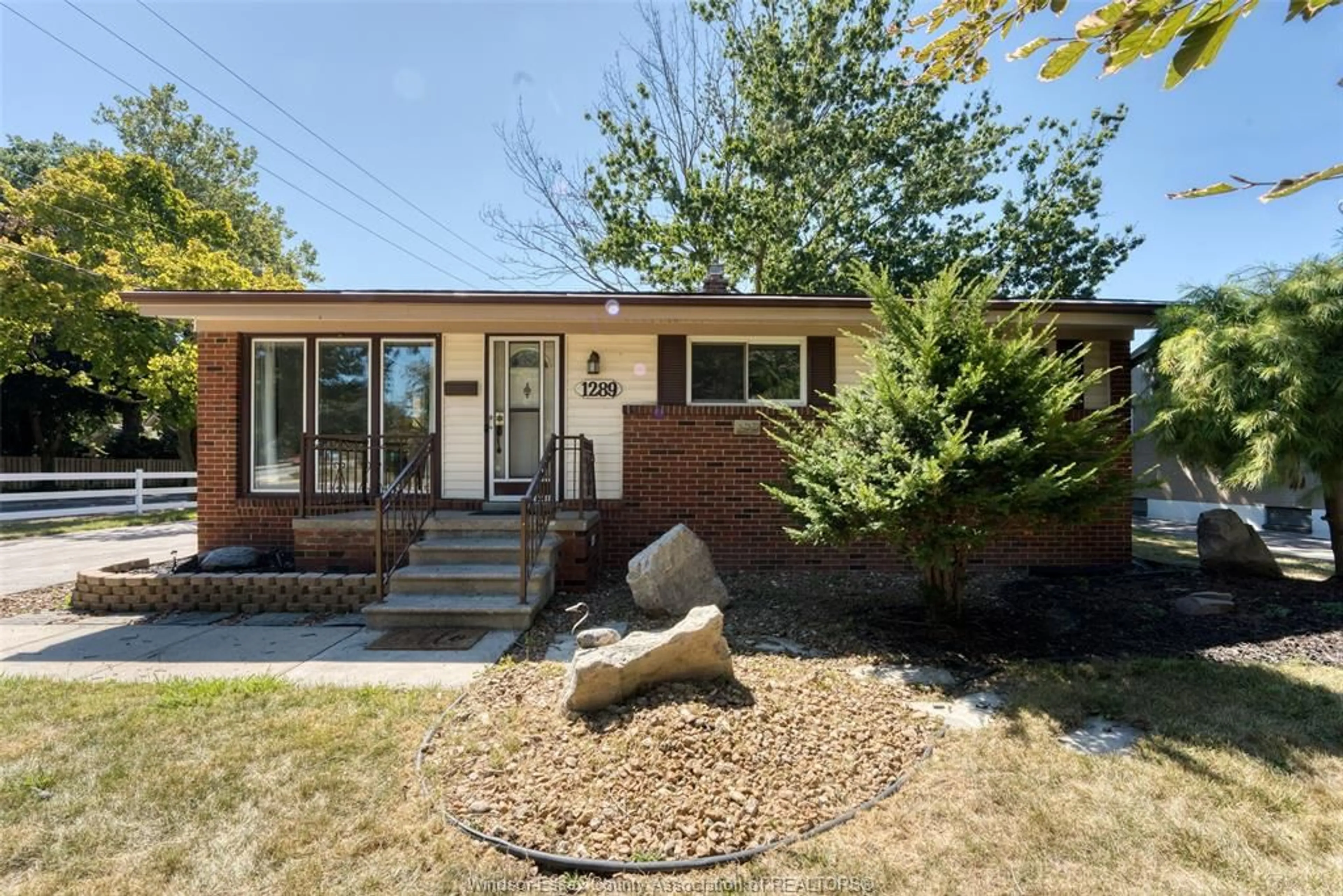 Home with brick exterior material, street for 1289 Isabelle PL, Windsor Ontario N8S 3B3