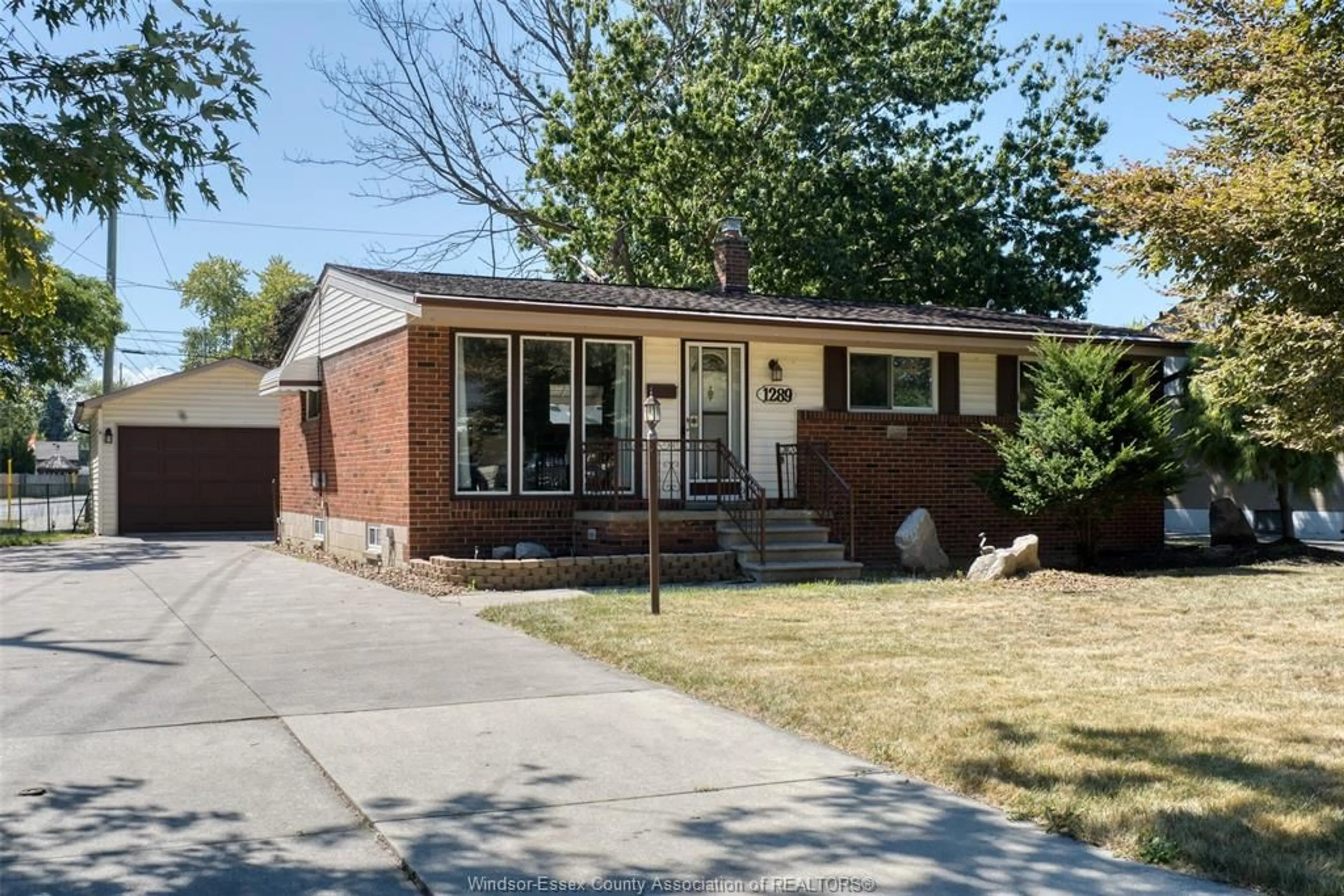 Home with brick exterior material, street for 1289 Isabelle PL, Windsor Ontario N8S 3B3