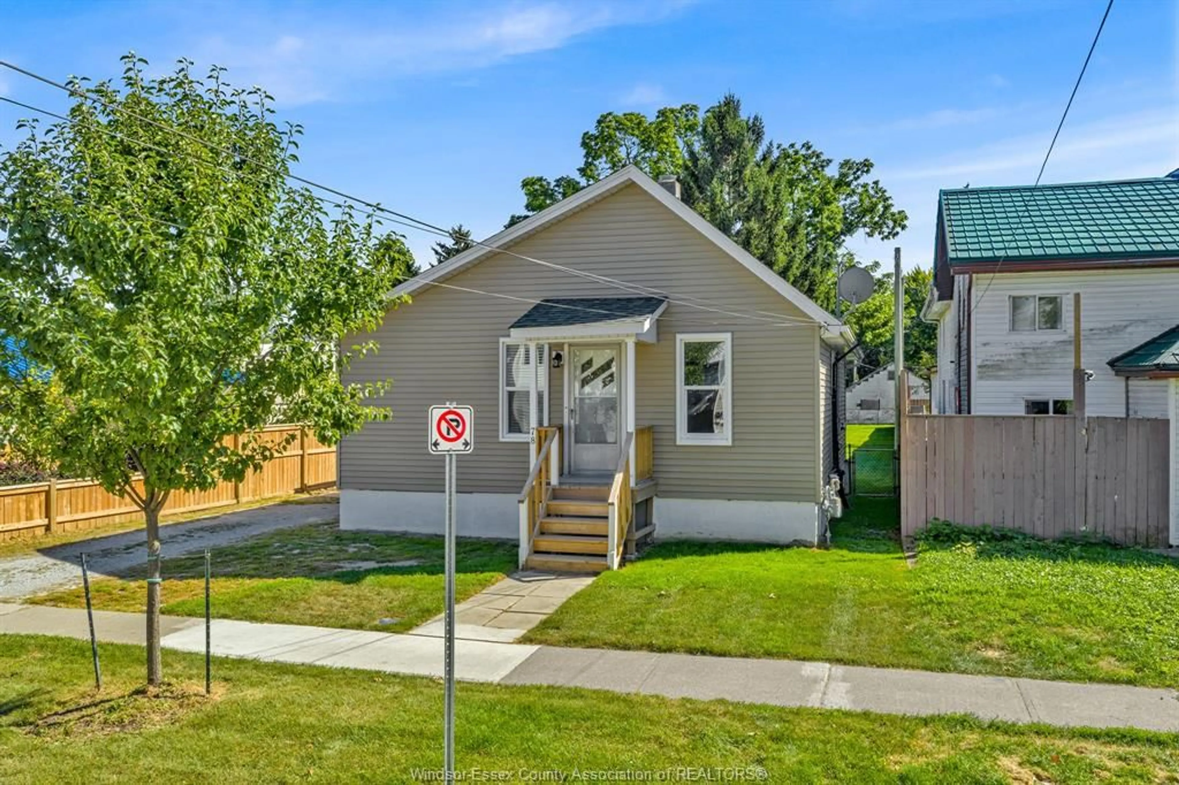 Home with vinyl exterior material, street for 78 Setterington St., Leamington Ontario N8H 1T6