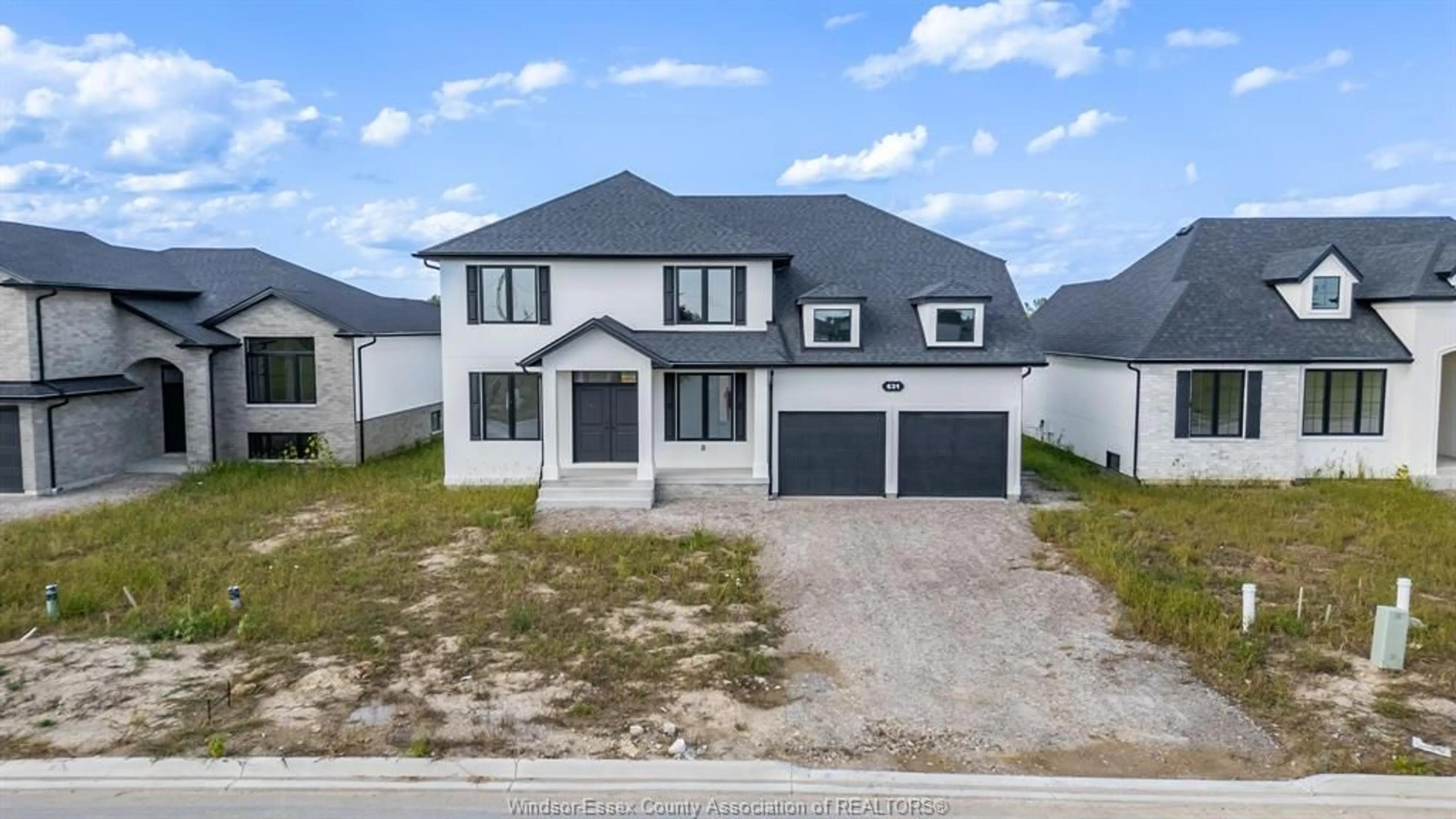 A pic from outside/outdoor area/front of a property/back of a property/a pic from drone, street for 631 SUMMIT, Lakeshore Ontario N0R 1A7