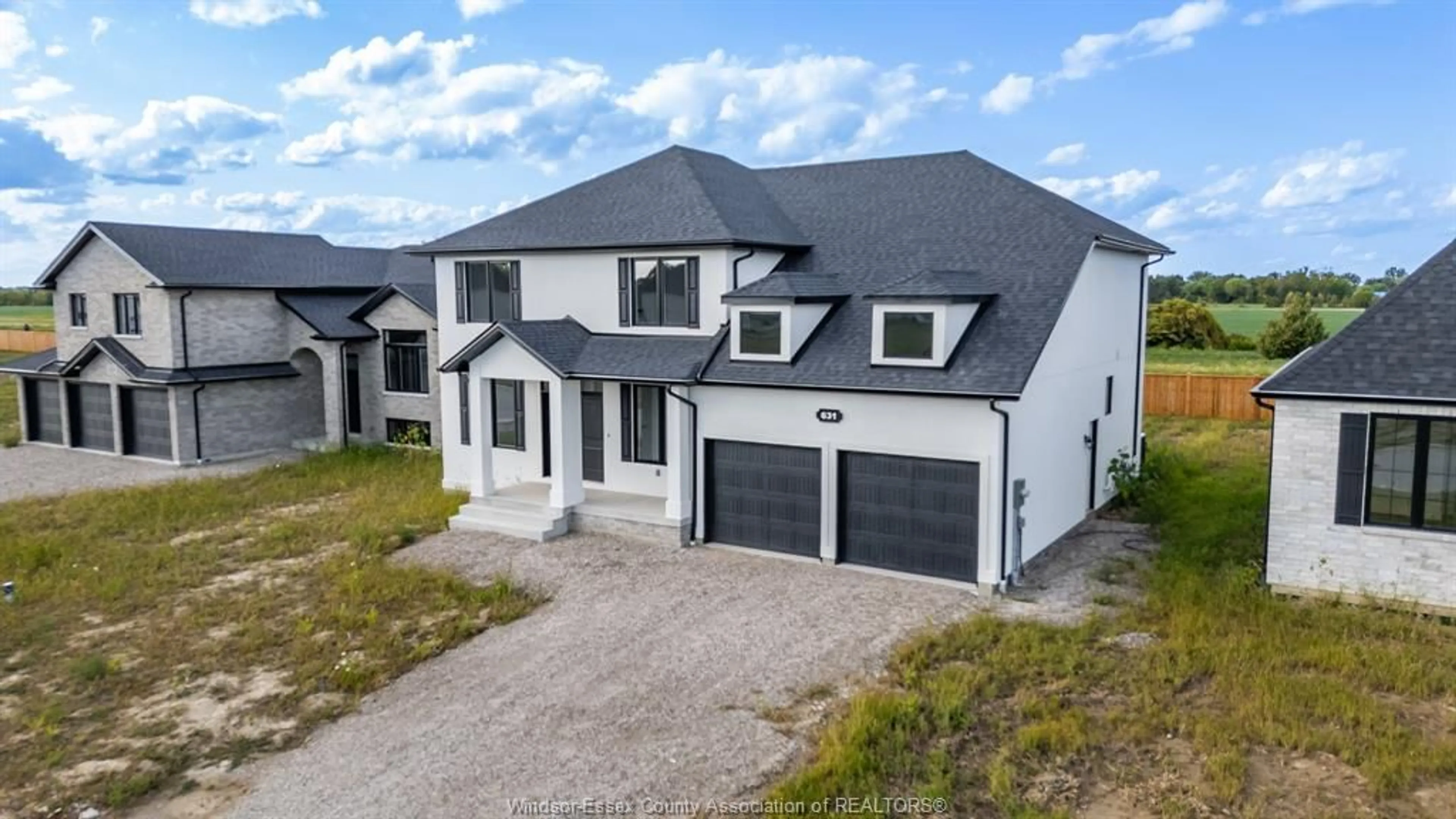 A pic from outside/outdoor area/front of a property/back of a property/a pic from drone, unknown for 631 SUMMIT, Lakeshore Ontario N0R 1A7