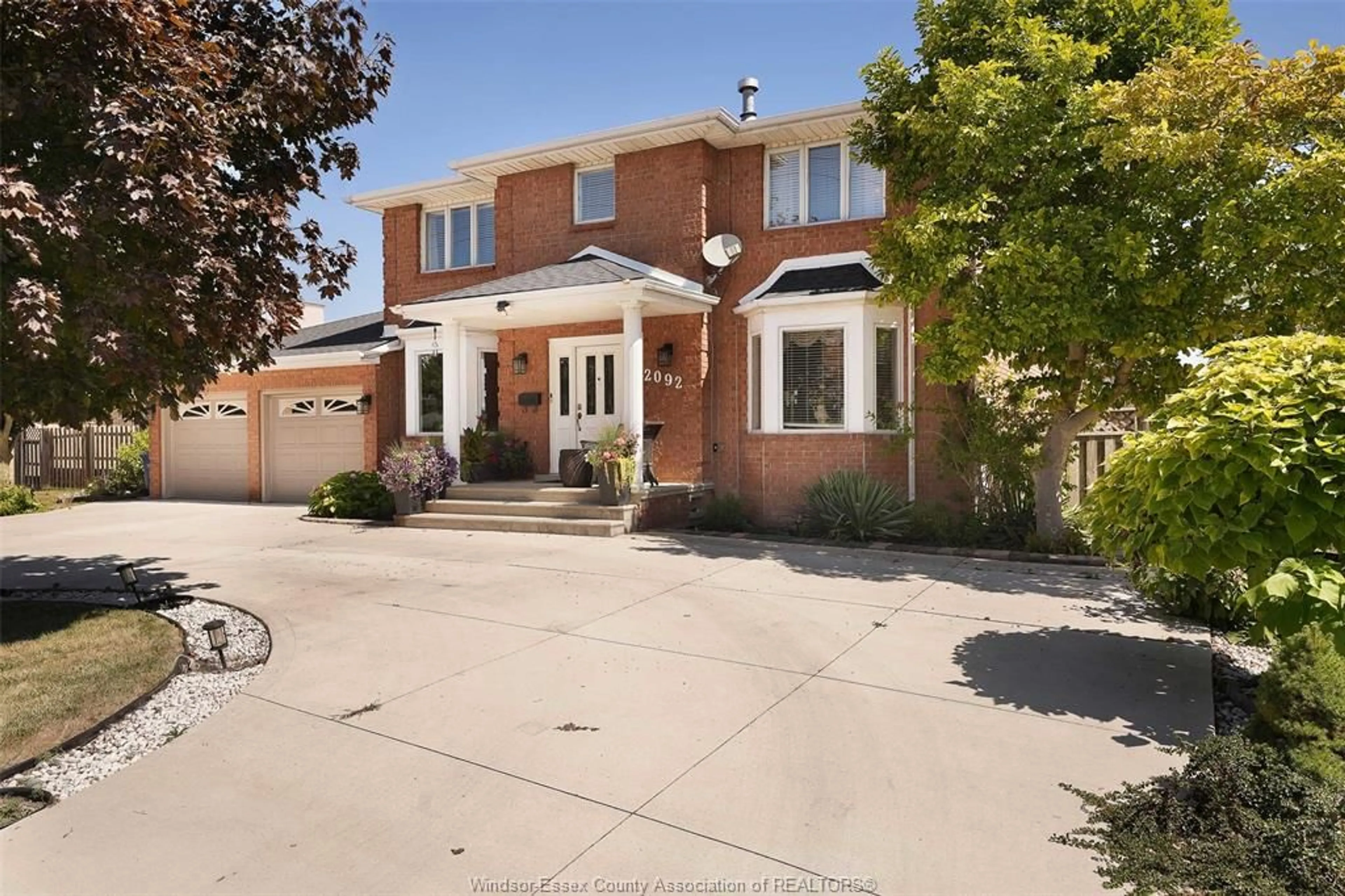 Home with brick exterior material, street for 2092 Lesperance, Tecumseh Ontario N8N 2N4