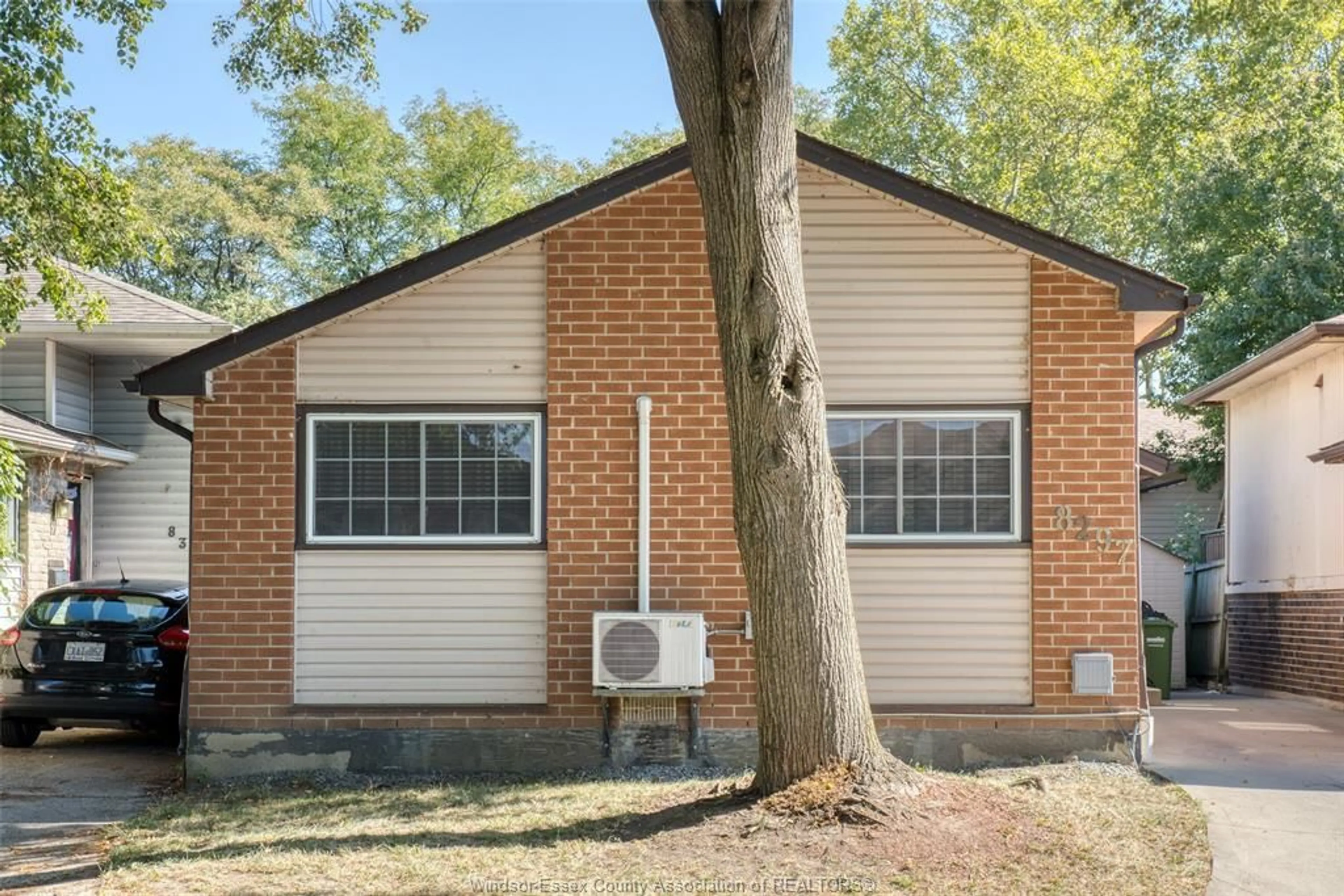 Home with brick exterior material, street for 8297 GREGORY Pl, Windsor Ontario N8S 4N3