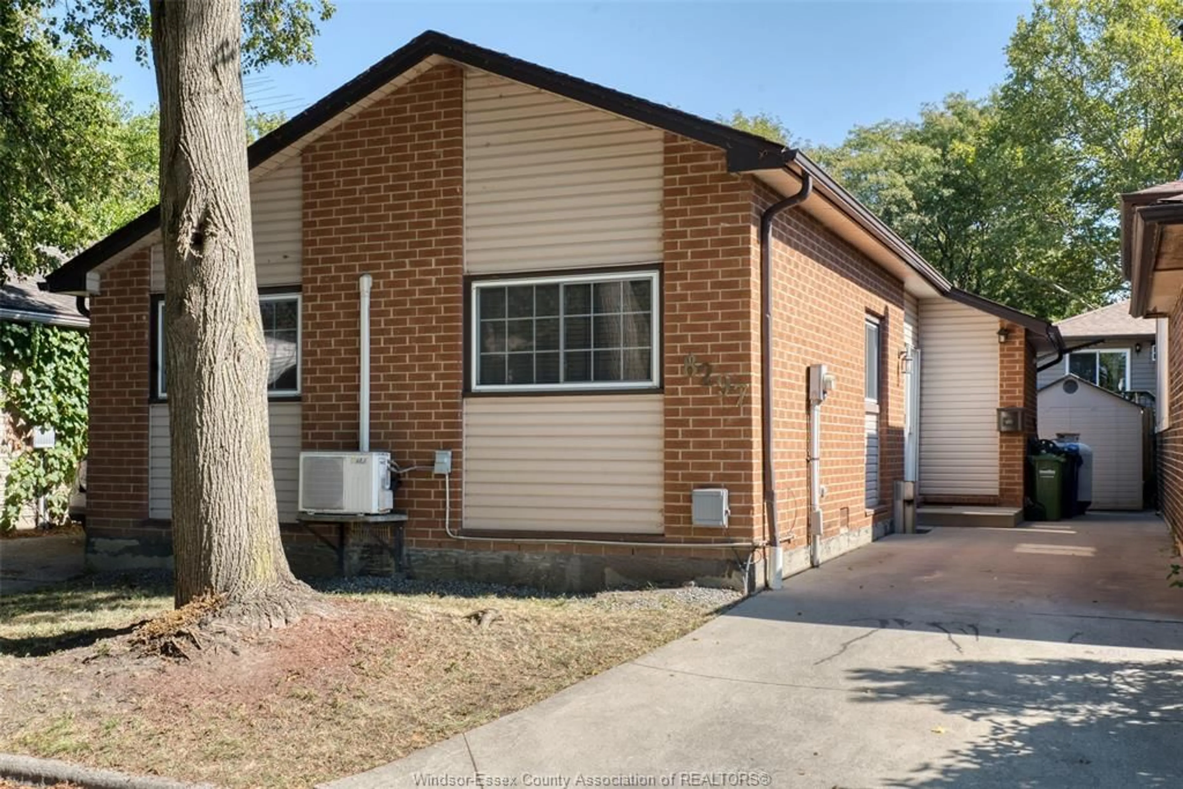Home with brick exterior material, street for 8297 GREGORY Pl, Windsor Ontario N8S 4N3