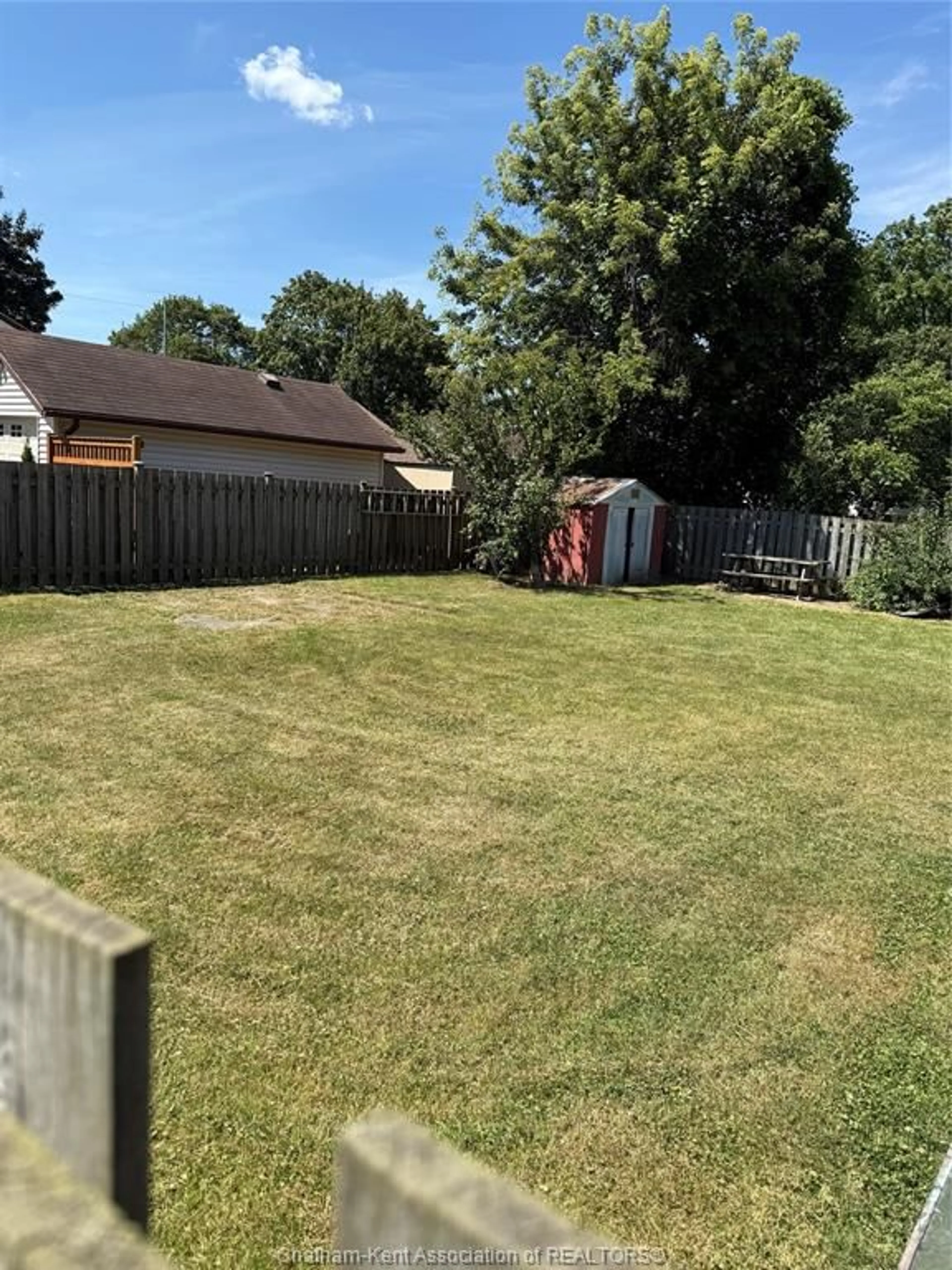A pic from outside/outdoor area/front of a property/back of a property/a pic from drone, street for 48 Simonton Dr, Chatham Ontario N7M 5C6