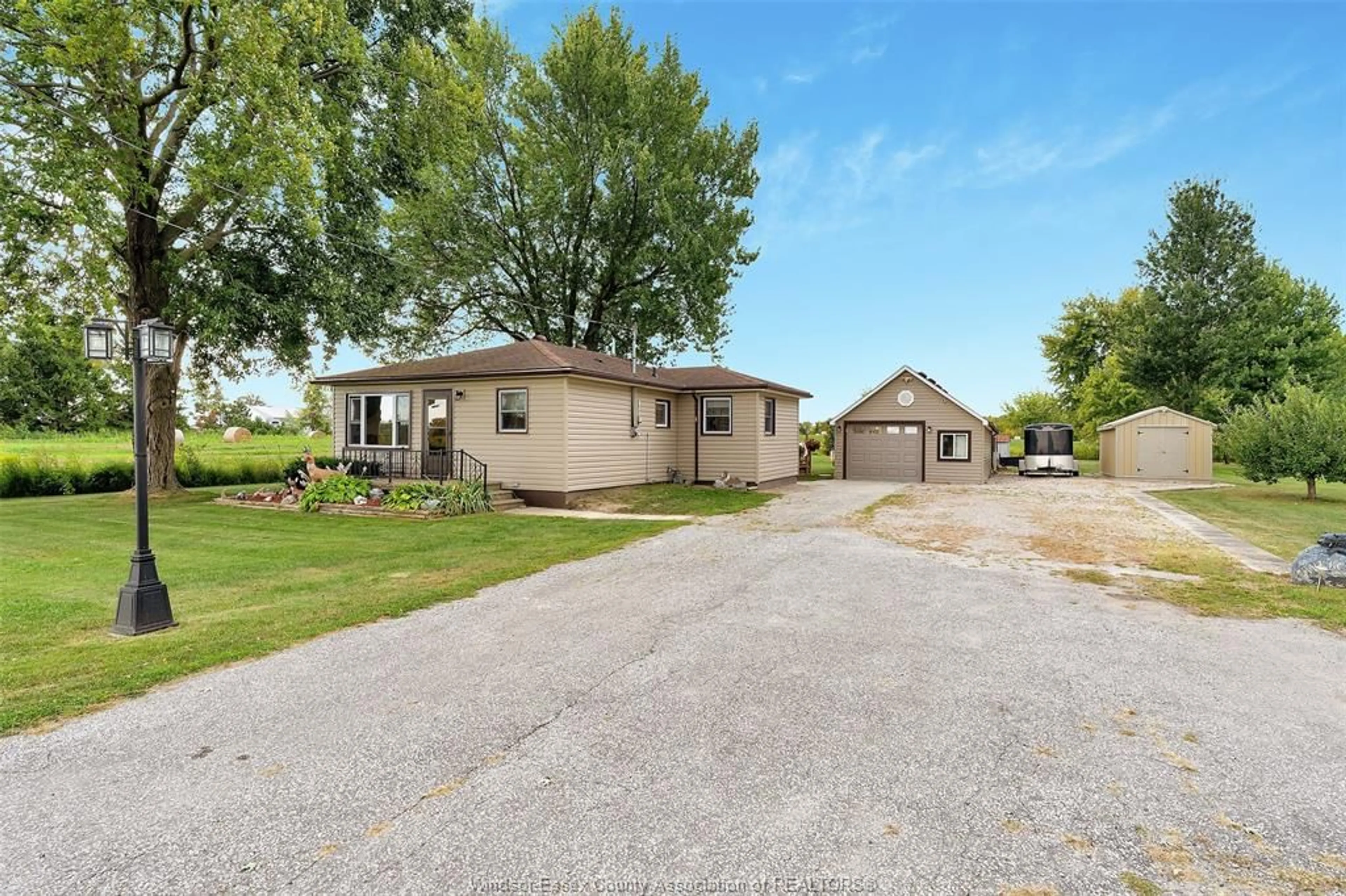 A pic from outside/outdoor area/front of a property/back of a property/a pic from drone, street for 3945 LAUZON Rd, Windsor Ontario N8N 2M1