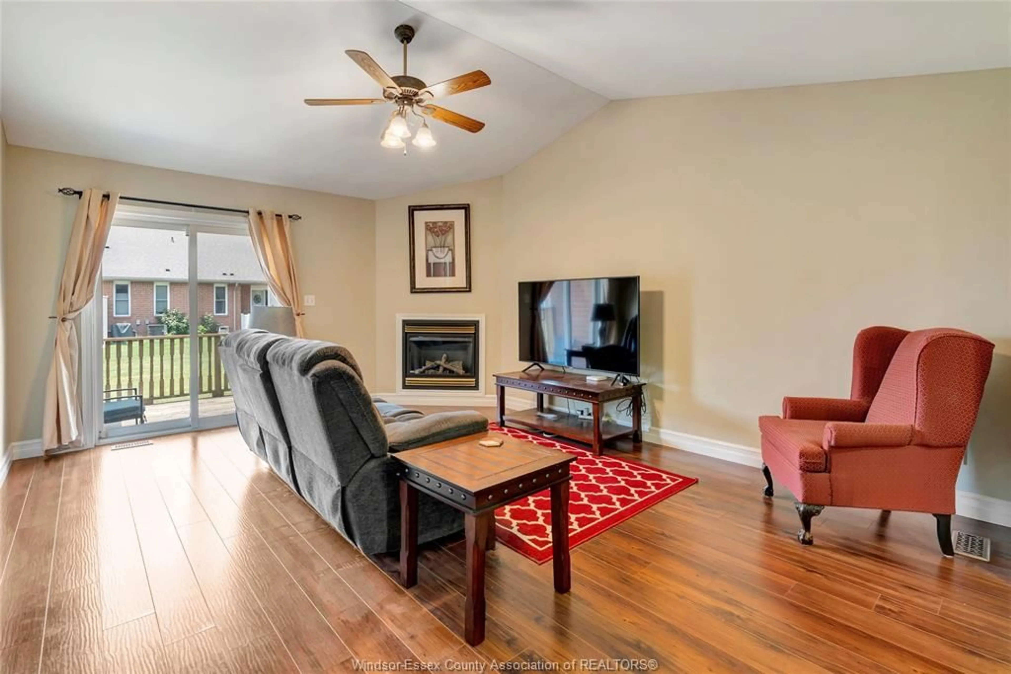 Living room with furniture, wood/laminate floor for 1875 CHATEAU, Windsor Ontario N8P 1M6