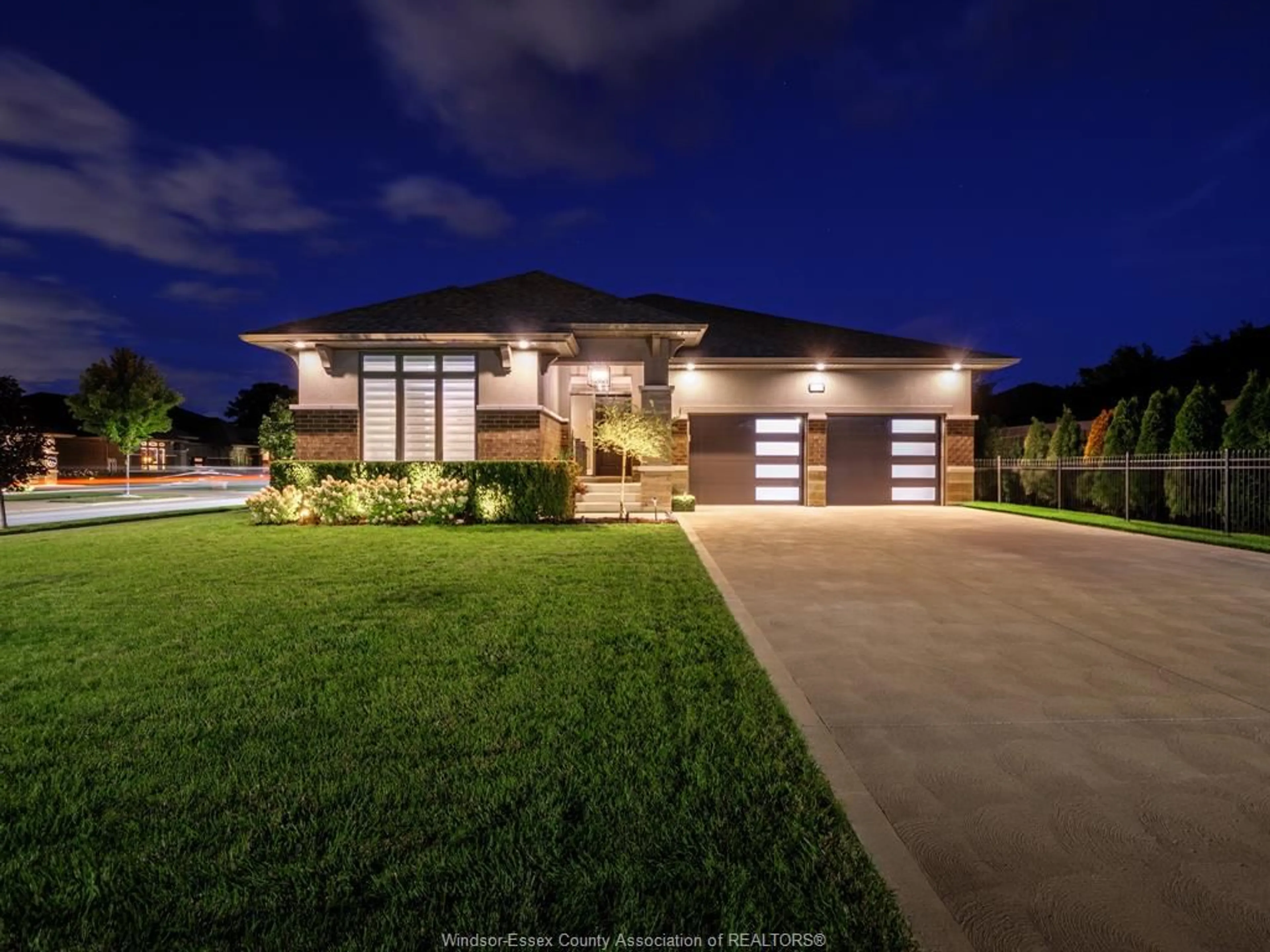Home with brick exterior material, street for 5025 WHISPERING PINES Cres, LaSalle Ontario N9H 0E5