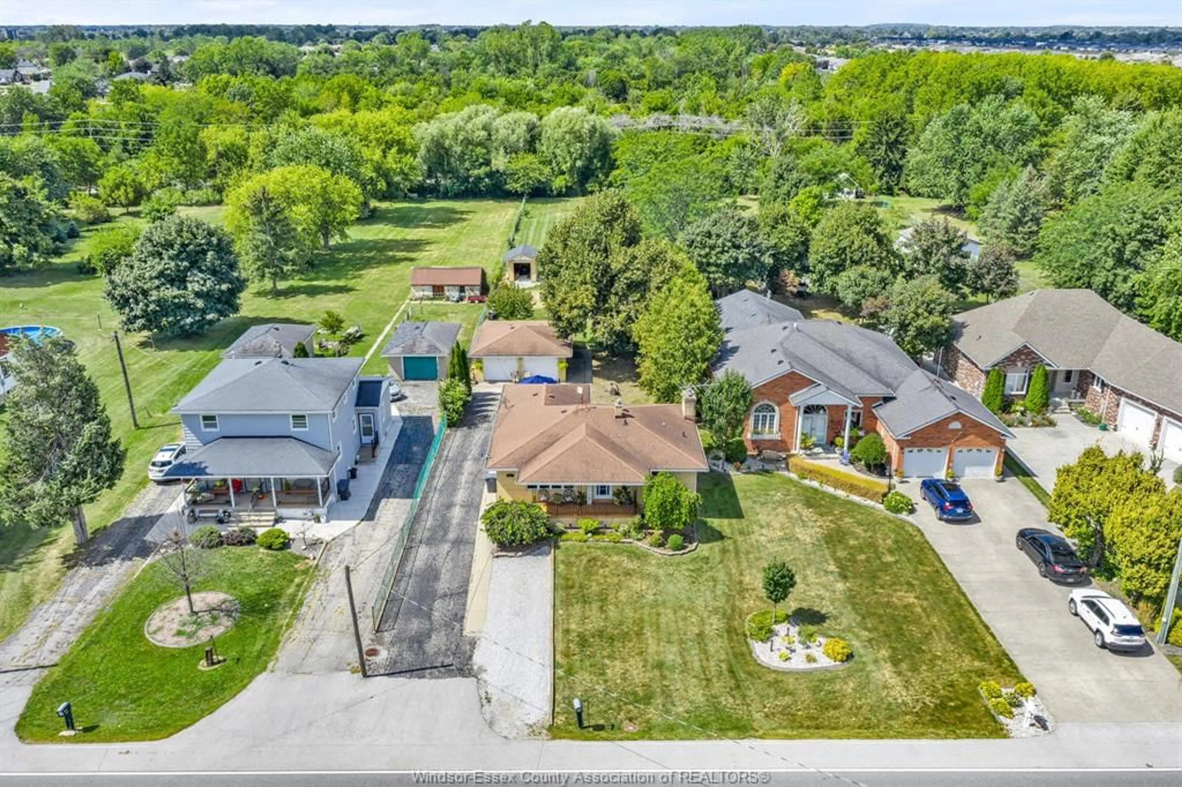 A pic from outside/outdoor area/front of a property/back of a property/a pic from drone, street for 542 CONCESSION RD 2, Amherstburg Ontario N9V 3E3