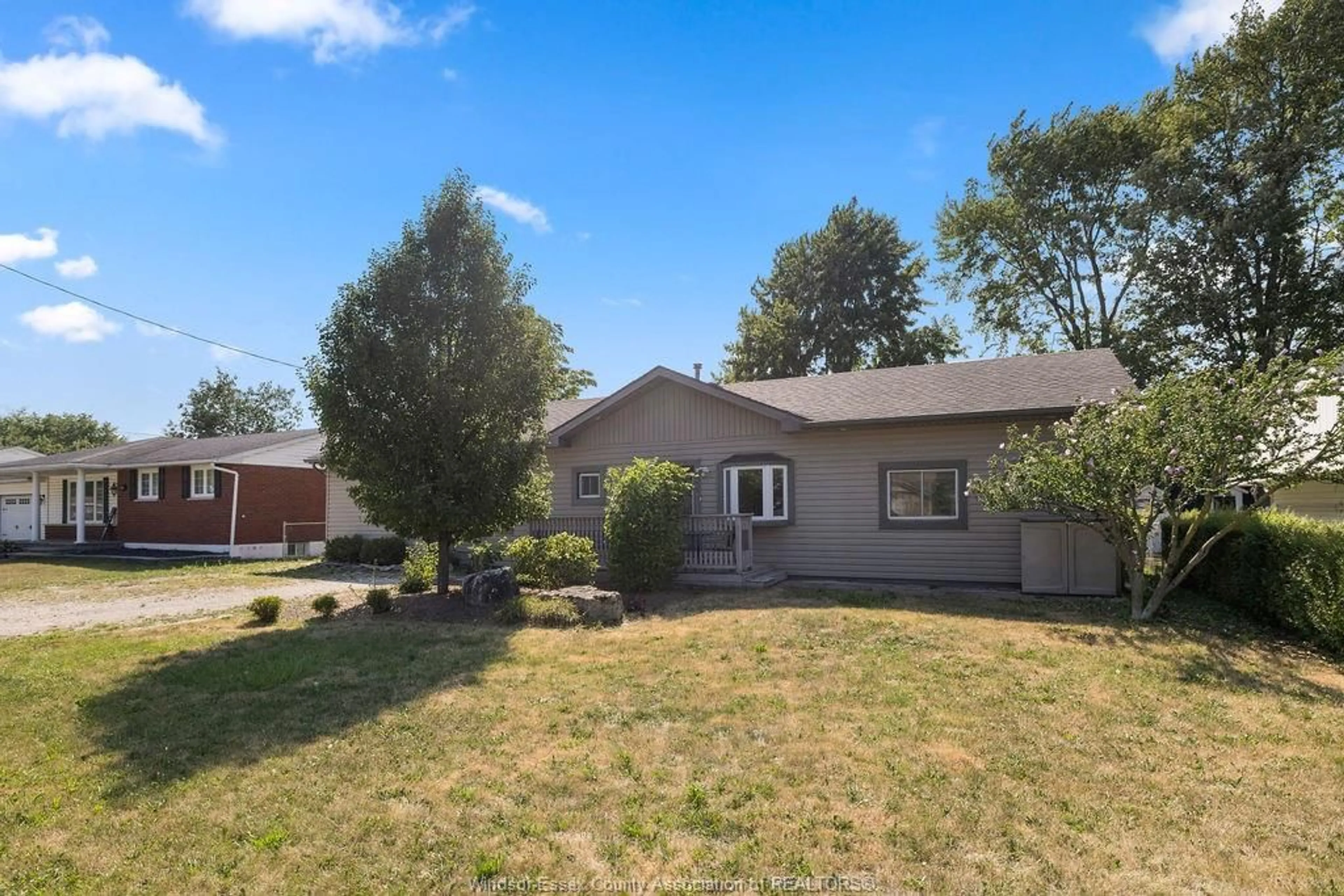 Home with vinyl exterior material, street for 215 Dubois, Lakeshore Ontario N0R 1C0