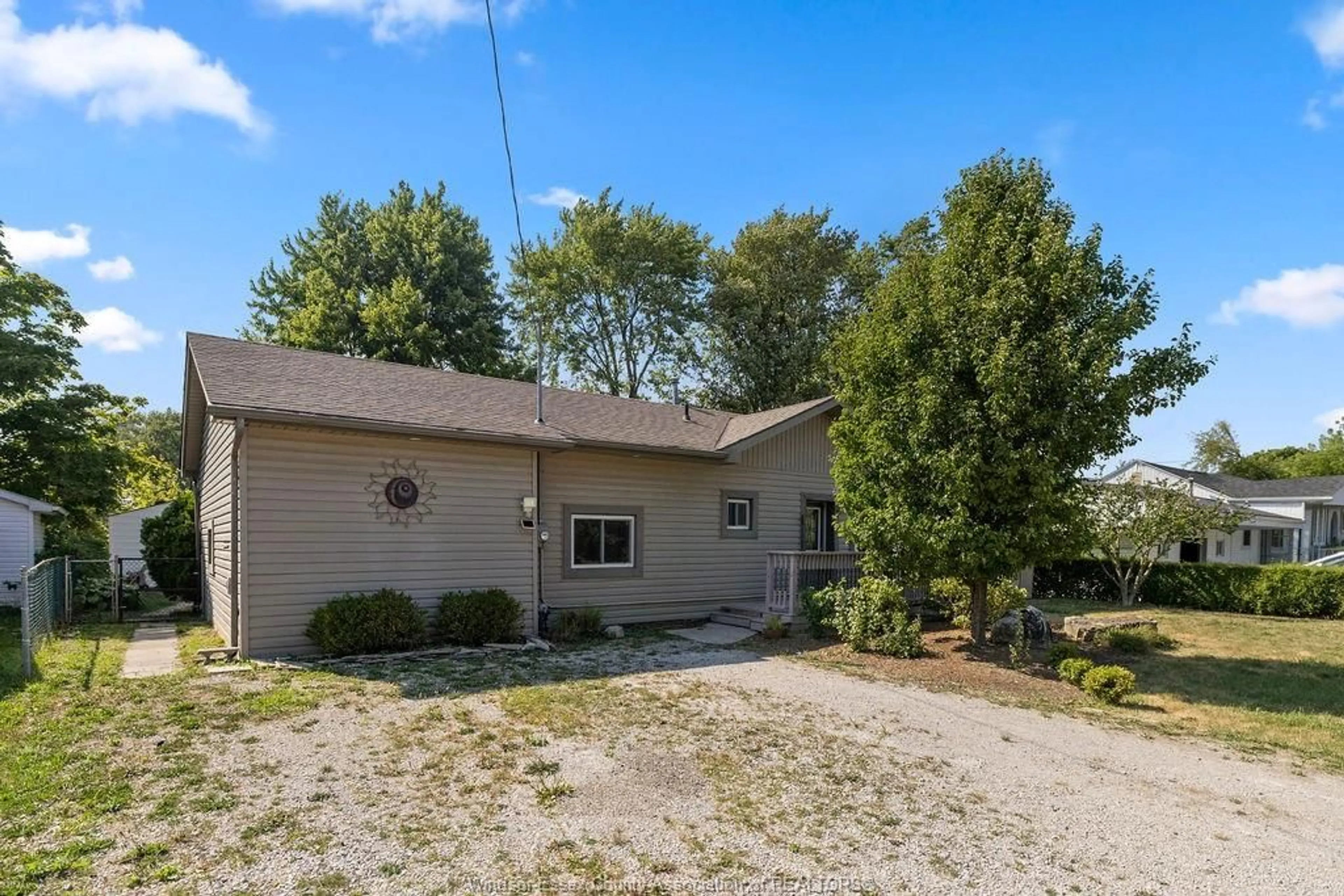 A pic from outside/outdoor area/front of a property/back of a property/a pic from drone, street for 215 Dubois, Lakeshore Ontario N0R 1C0