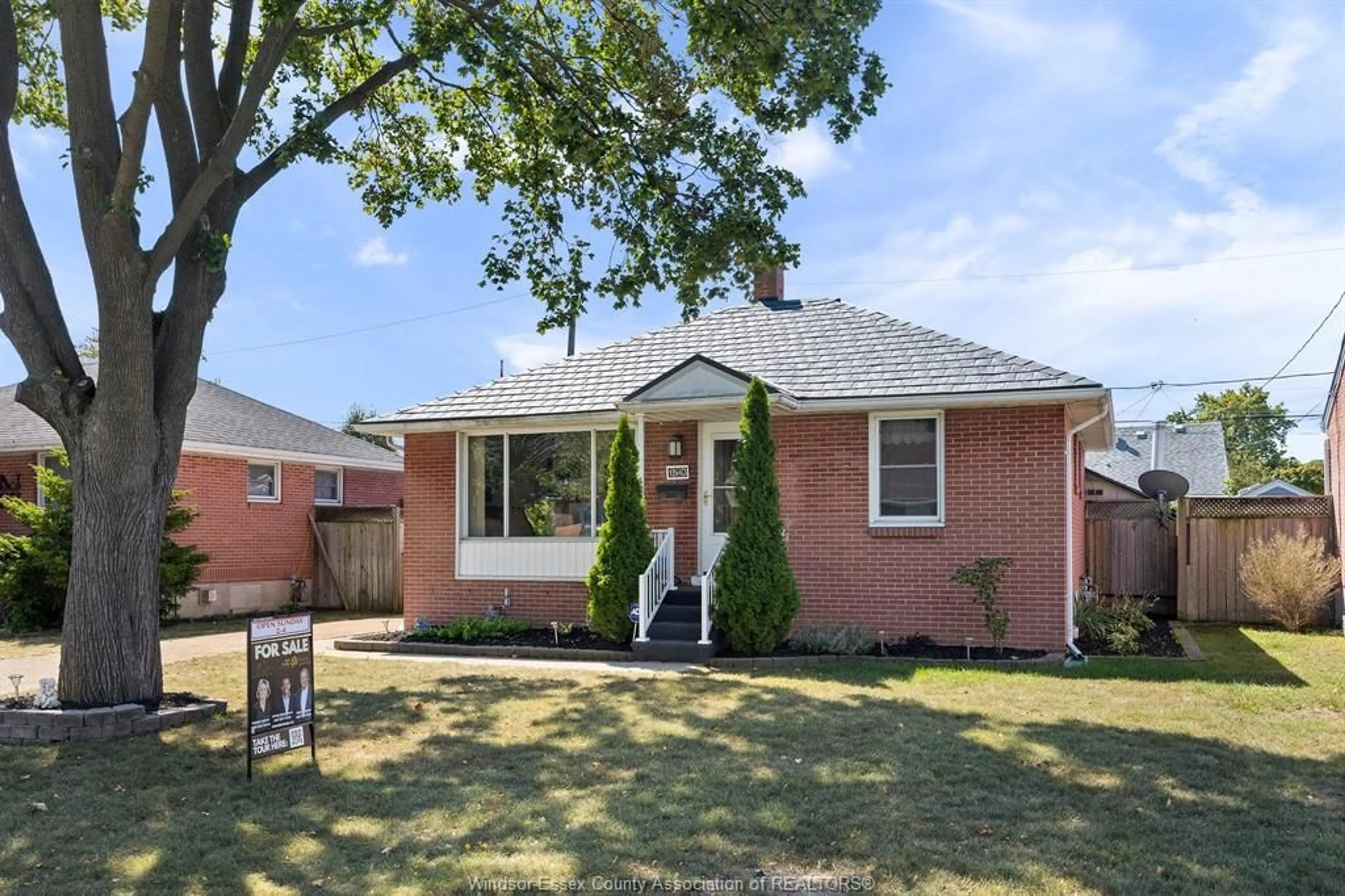 Home with brick exterior material, street for 1543 REDWOOD Ave, Windsor Ontario N9C 3P4