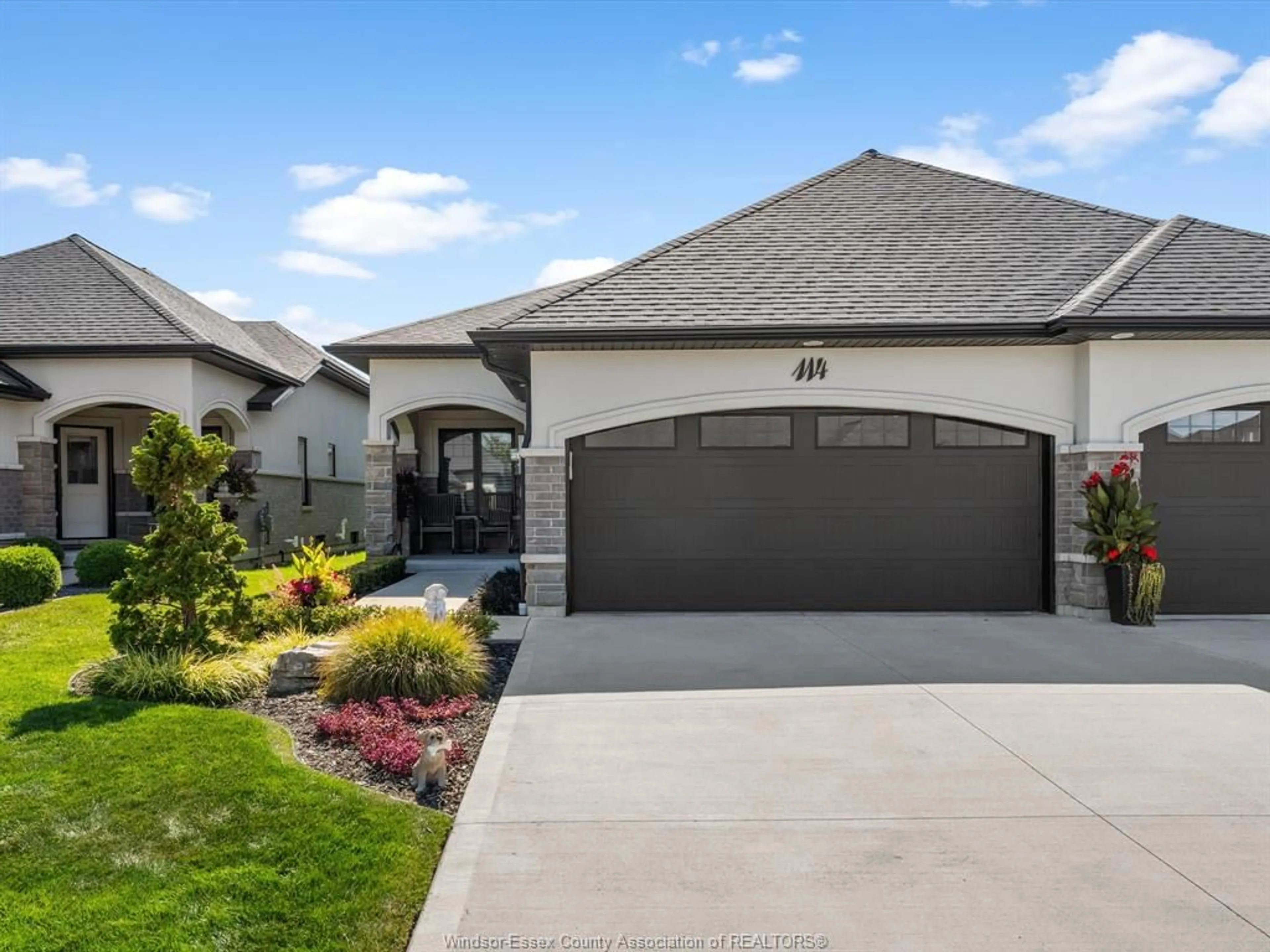 Home with vinyl exterior material, street for 114 HOUGHTON St, Essex Ontario N8M 0A5