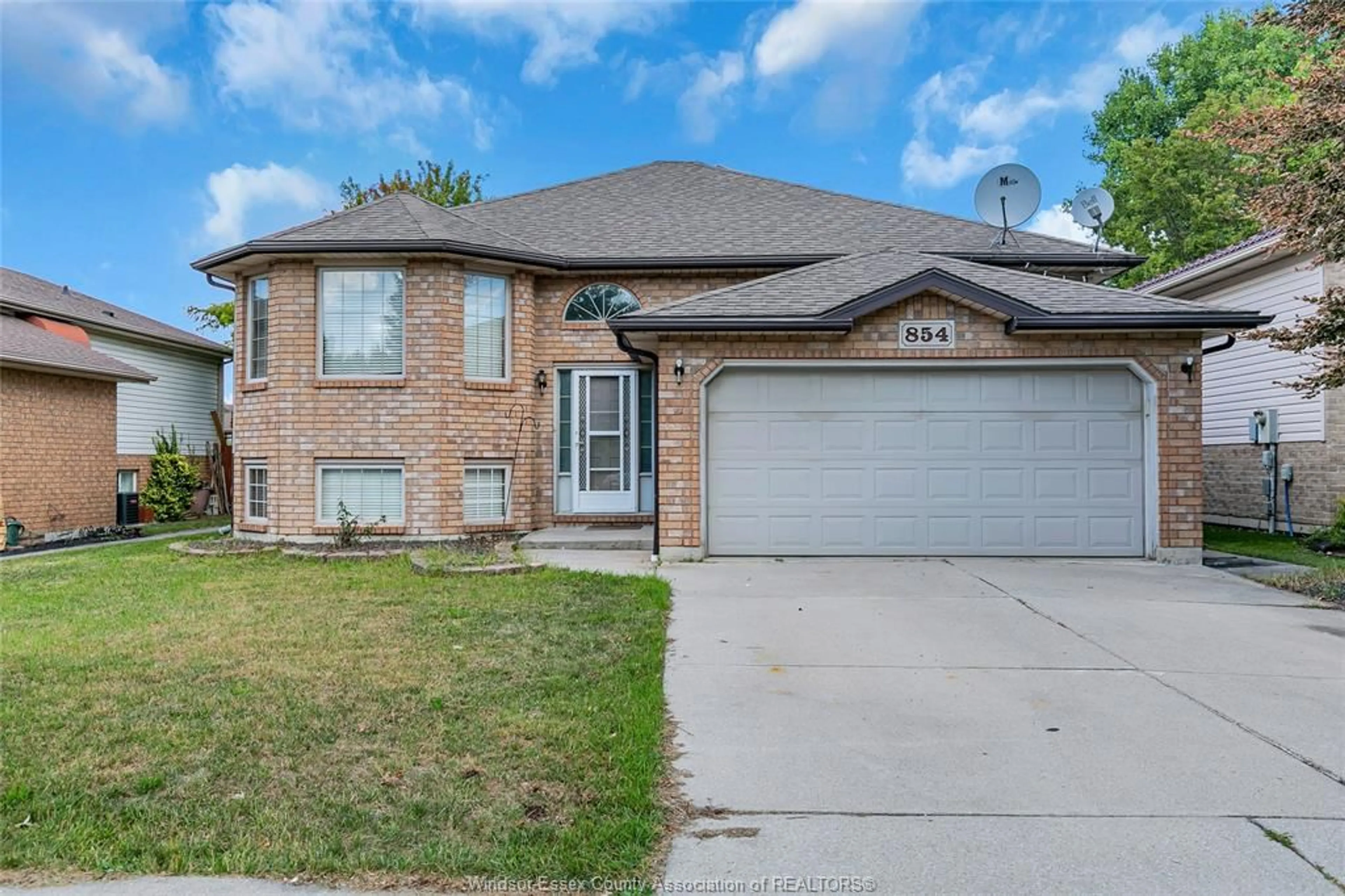 Home with brick exterior material, street for 854 SILVERDALE Dr, Windsor Ontario N9G 2Z3