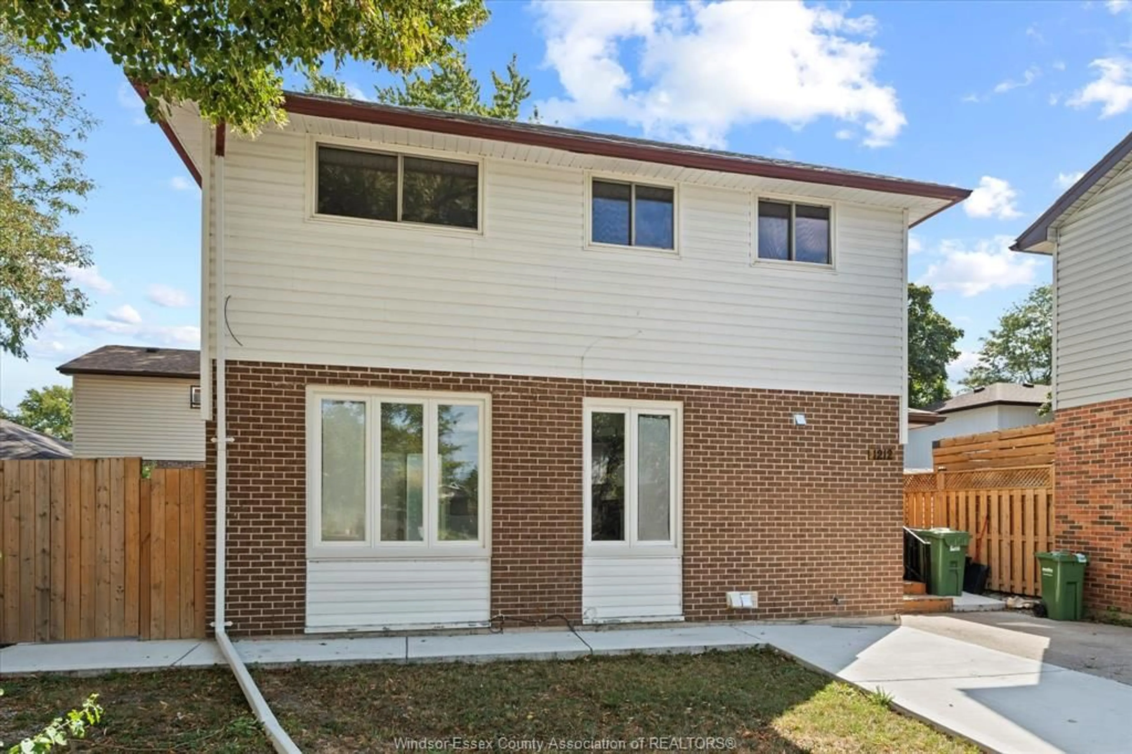 Home with brick exterior material, street for 1212 Copperfield Pl, Windsor Ontario N8S 4G6