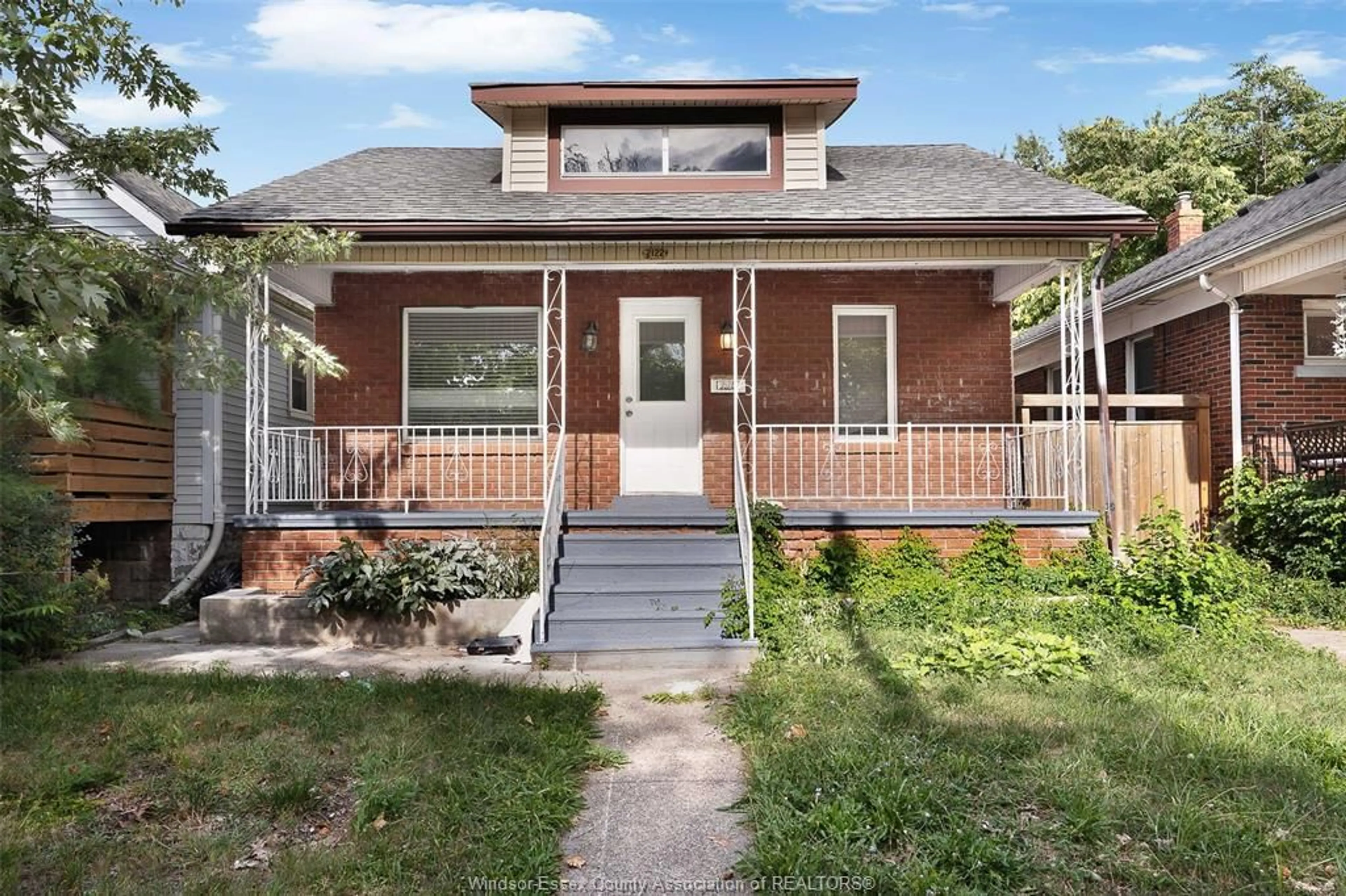 Home with brick exterior material, street for 2122 Church St, Windsor Ontario N8X 1V7