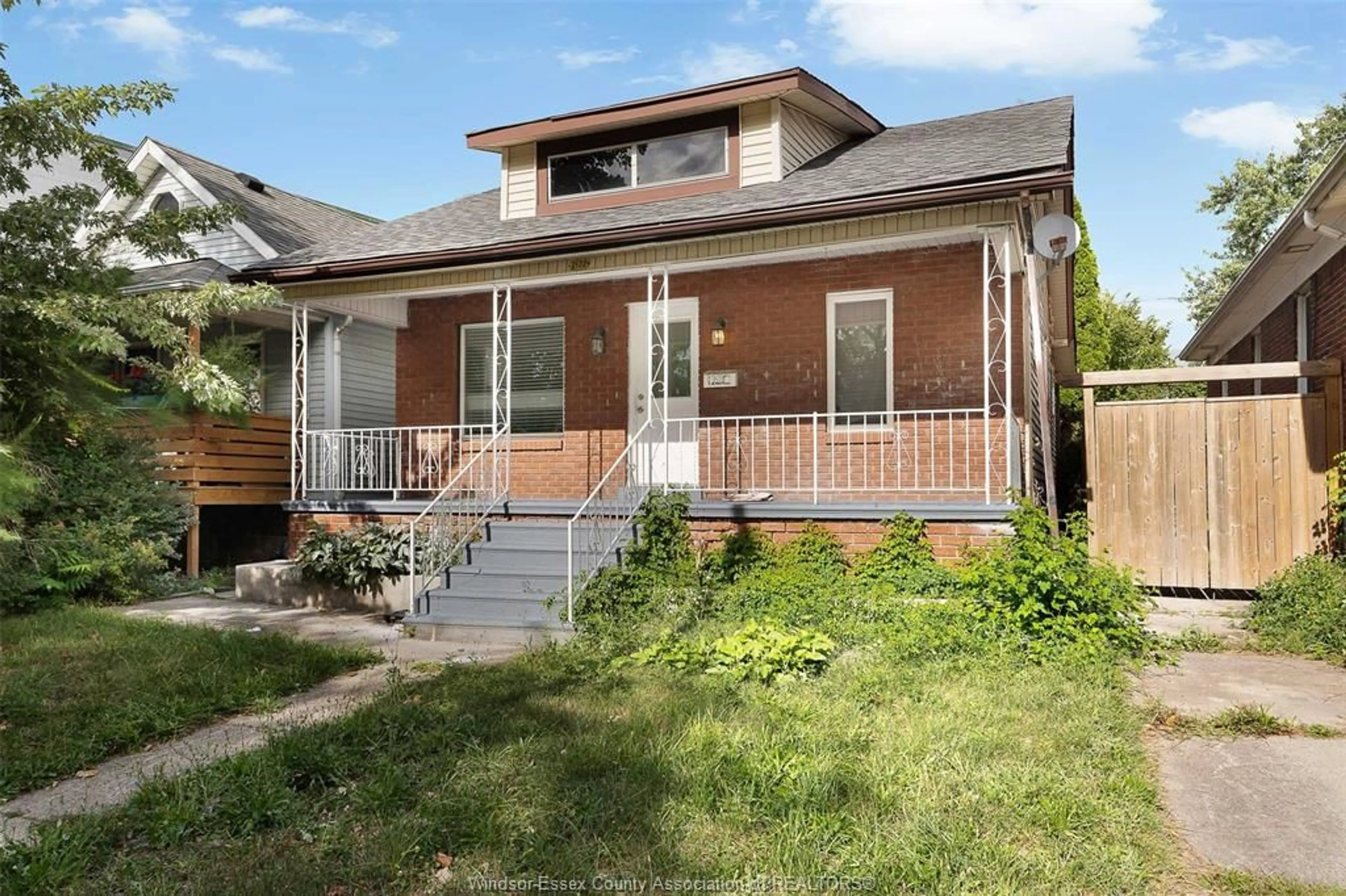 Home with brick exterior material, street for 2122 Church St, Windsor Ontario N8X 1V7